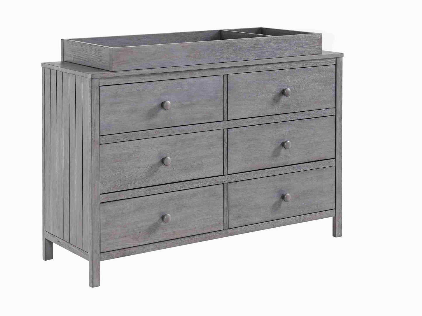 Everlee Changing Topper - Inclined Side View of Everlee Changing Topper on Top of 6 Drawer Dresser Gray