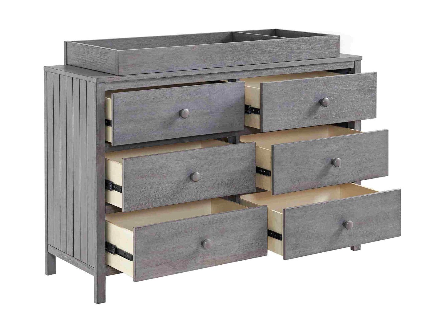 Everlee Changing Topper - Inclined Side View of Everlee Changing Topper on Top of Open 6 Drawer Dresser Gray