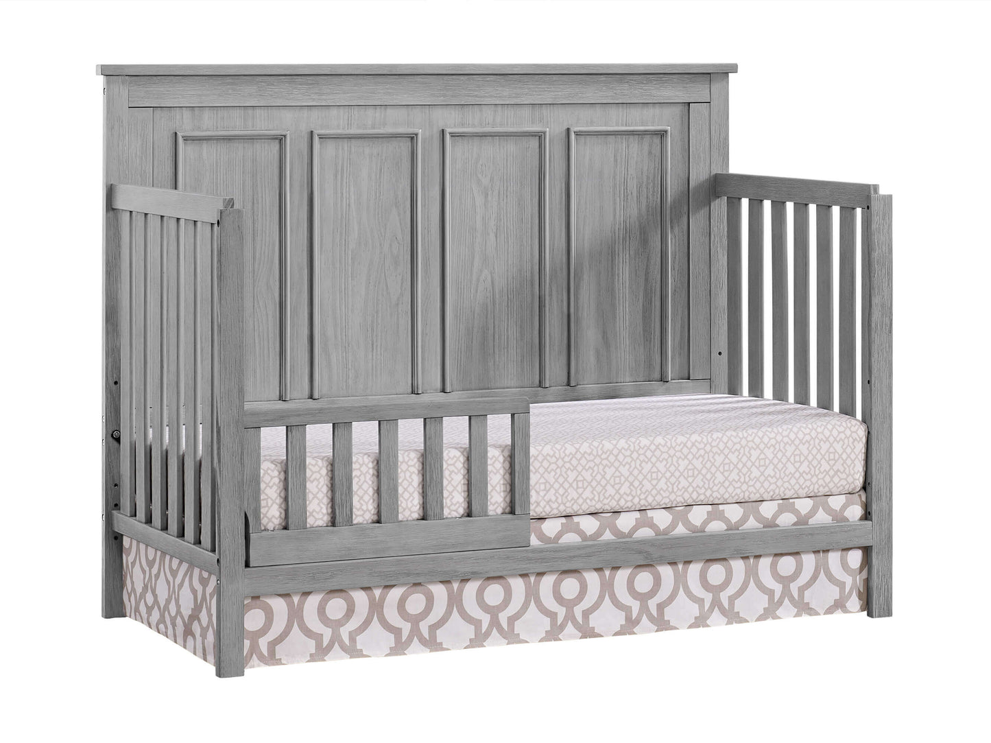 Bennett 4-in-1 Convertible Crib - Inclined Side View of Bennett 4-in-1 Convertible Crib Rustic Gray with Guard Rail