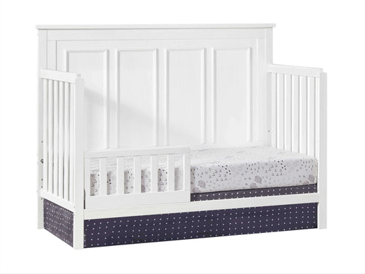 Bennett 4-in-1 Convertible Crib - Inclined Side View of Bennett 4-in-1 Convertible Crib Rustic White with Guard Rail