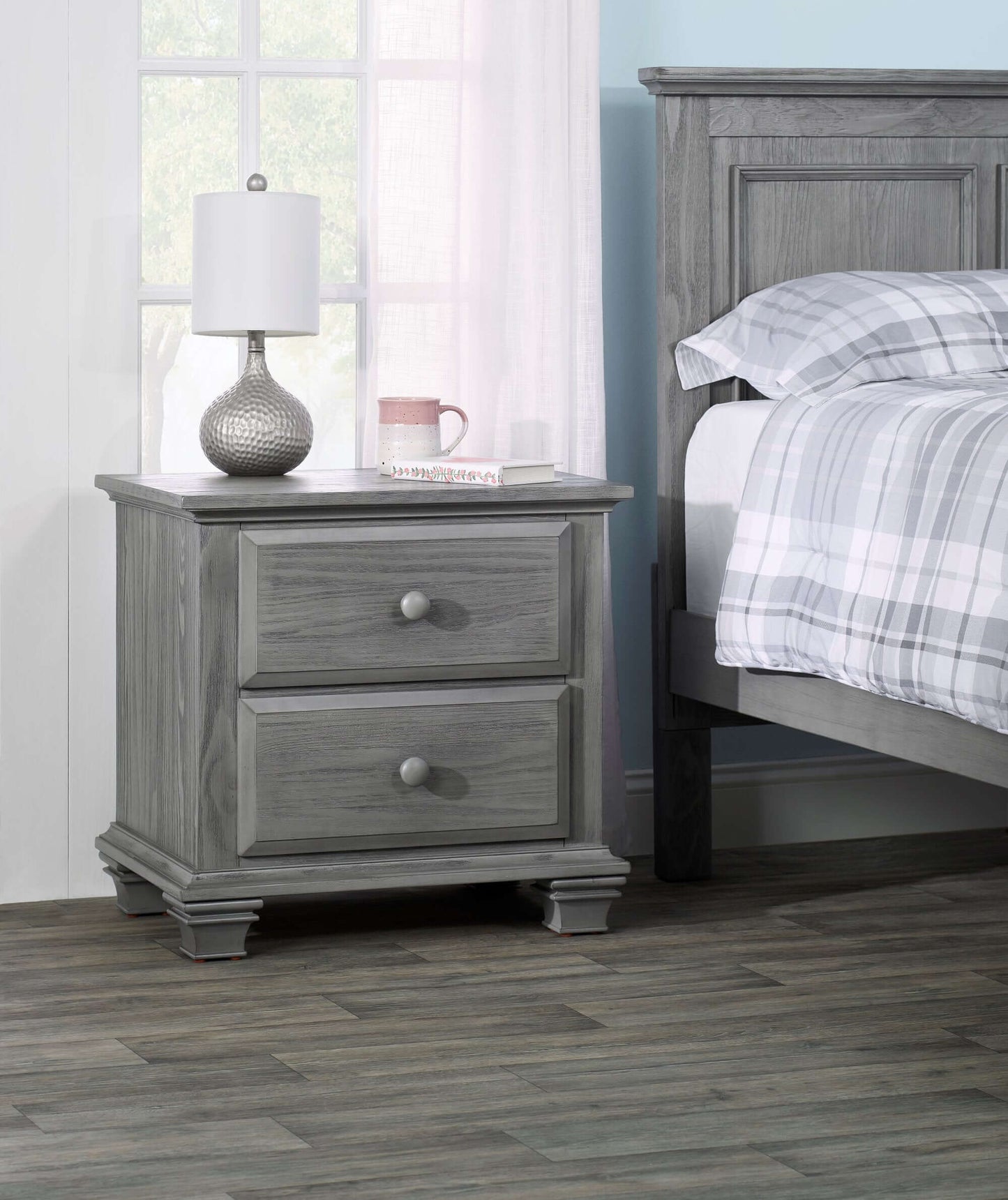 Kenilworth 2-Drawer Nightstand - Lifestyle Image Inclined Side View of Kenilworth 2-Drawer Nightstand Graphite Gray