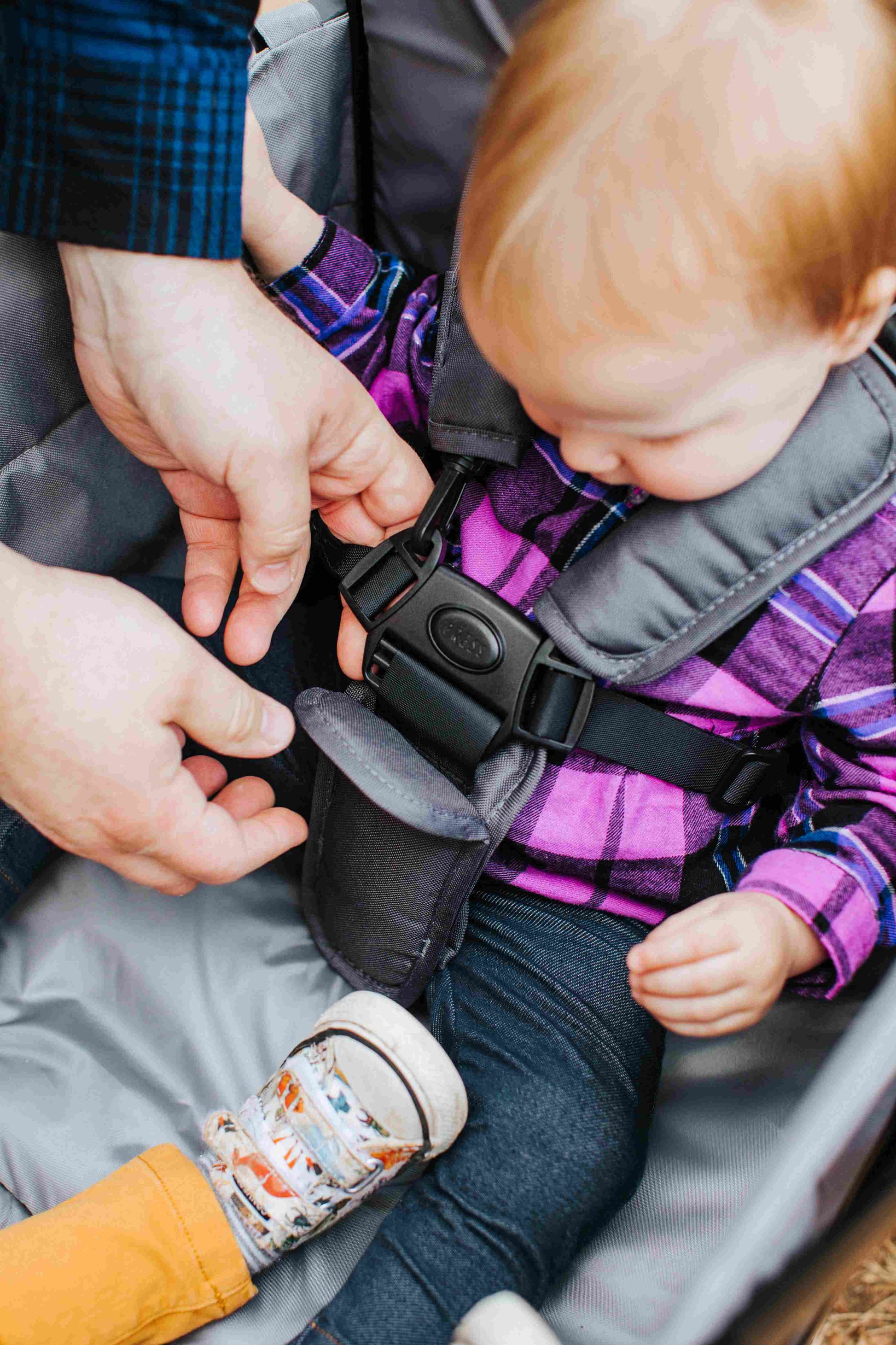 X2 Double Stroller Wagon - Zoomed Lifestyle Image Baby Harness of X2 Double Stroller Wagon Gray