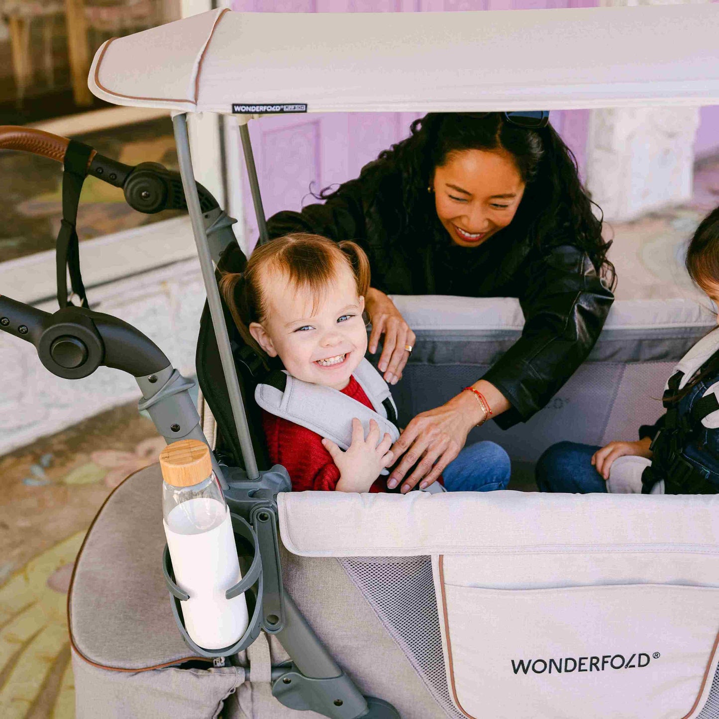 L4 Quad Stroller Wagon - Zoomed Lifestyle Image of Baby on L4 Quad Stroller Wagon