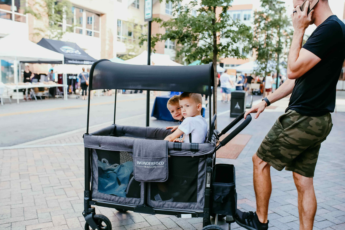 W4 Original Quad Stroller Wagon - Lifestyle Image Side View of Wagon Gray