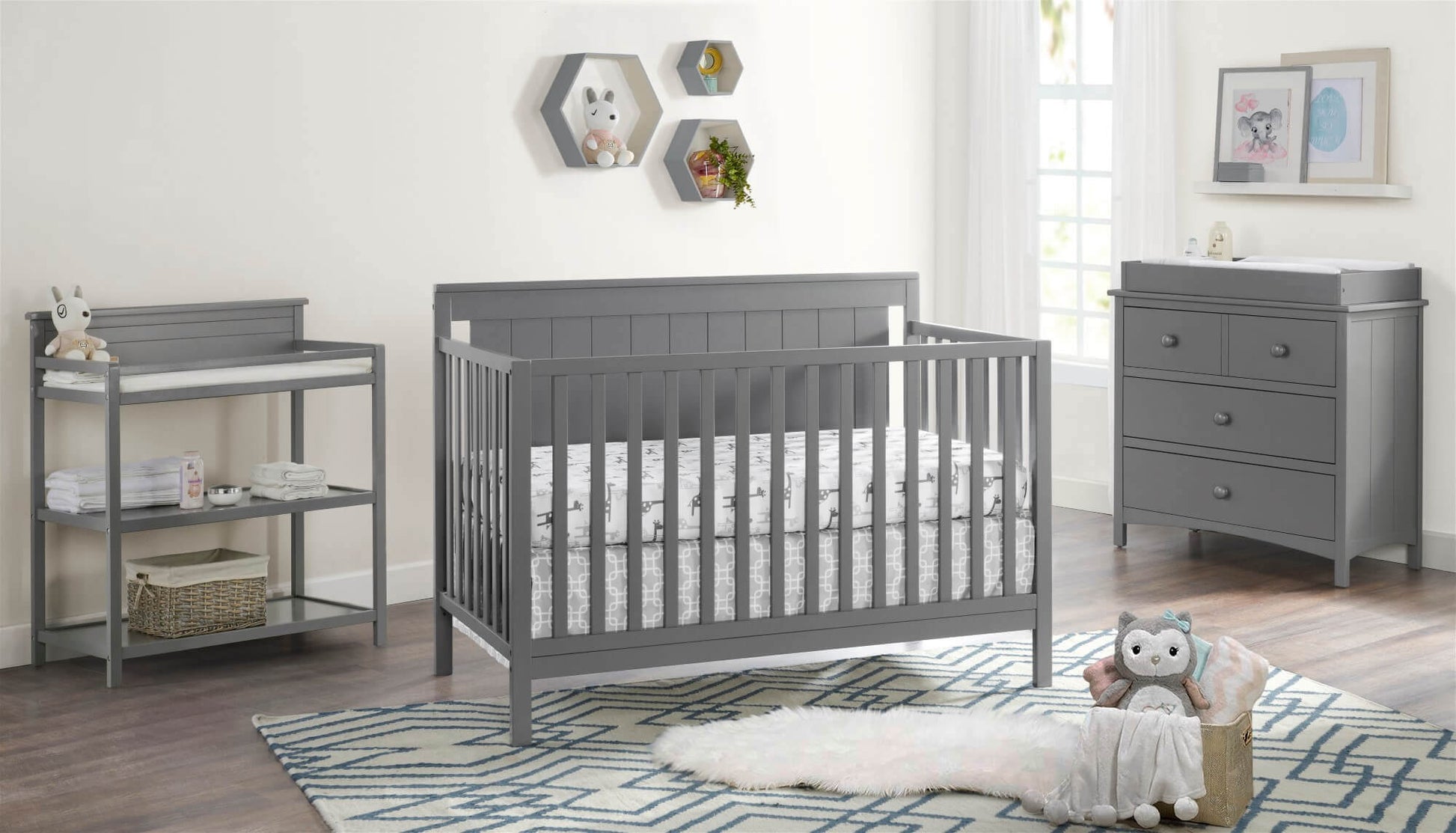 Lazio 4-in-1 Convertible Crib - Lifestyle Image Inclined Side View of Lazio 4-in-1 Convertible Crib Dove Gray