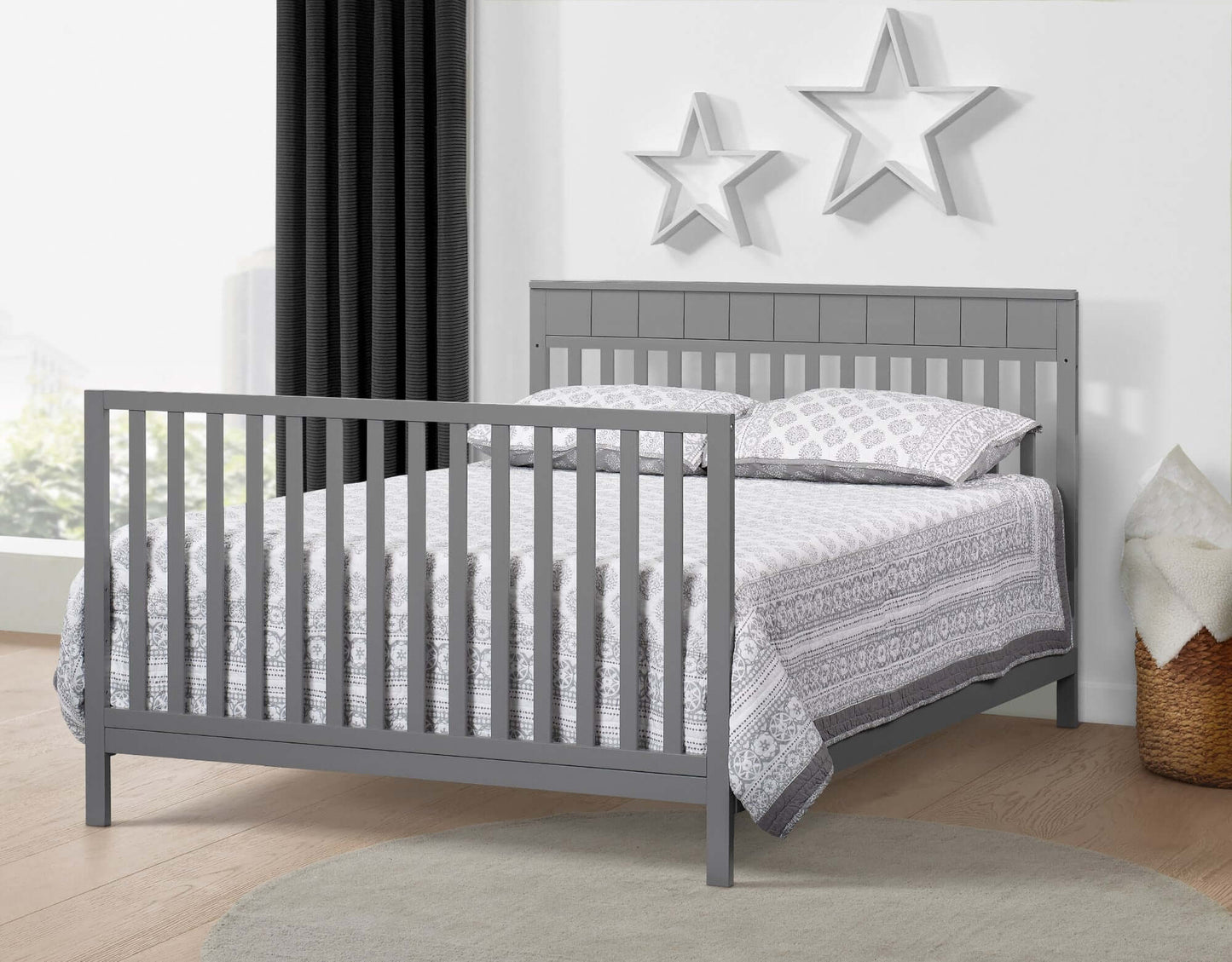 Logan 4-in-1 Convertible Crib - Lifestyle Image Inclined Side View of Logan Full Sized Bed Dove Gray