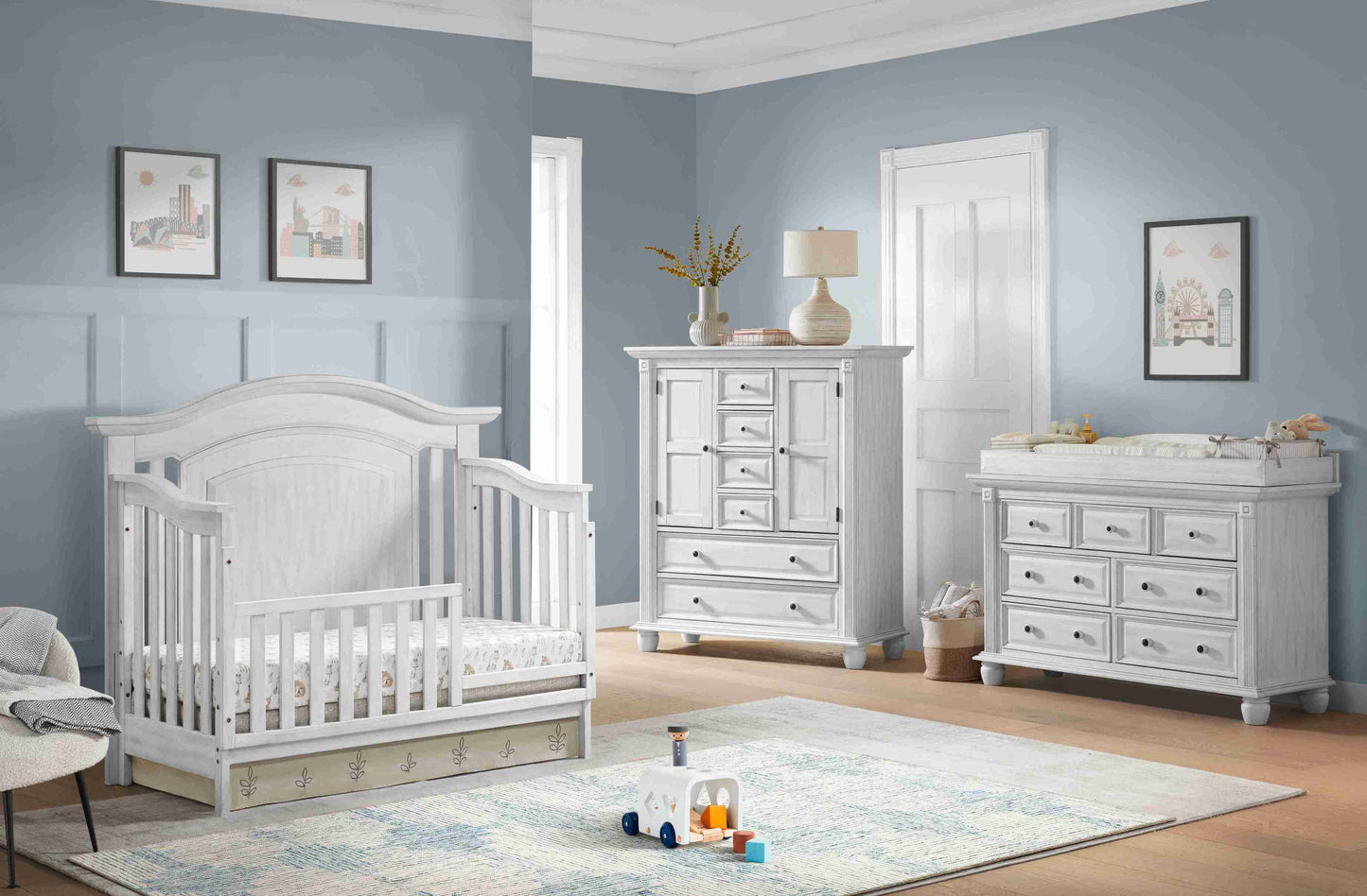 London Lane Guard Rail - Lifestyle Image Inclined Side View of London Lane Crib with Guard Rail White