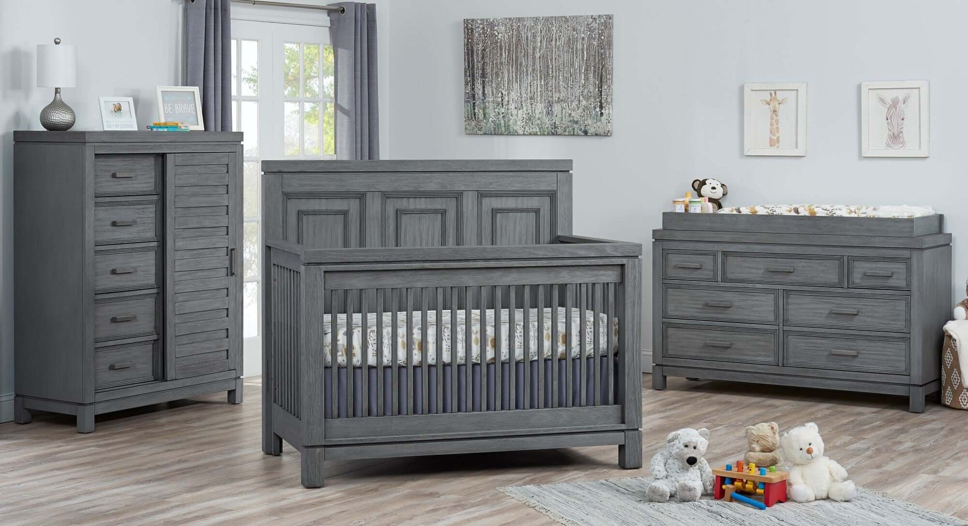 Manchester 4 In 1 Convertible Crib - Lifestyle Image Inclined Side View of Manchester 4 In 1 Convertible Crib Rustic Gray