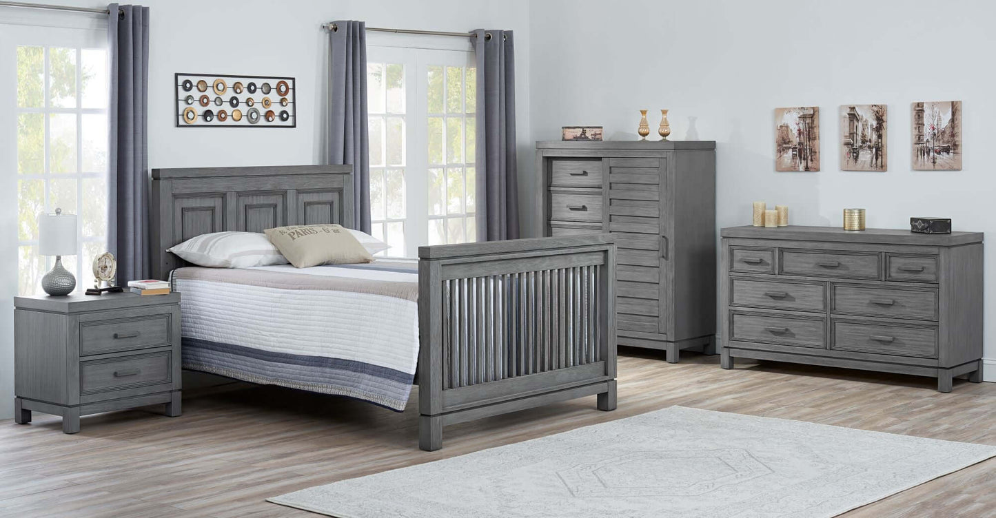 Manchester 4 In 1 Convertible Crib - Lifestyle Image Inclined Side View of Manchester Full Sized Bed Rustic Gray