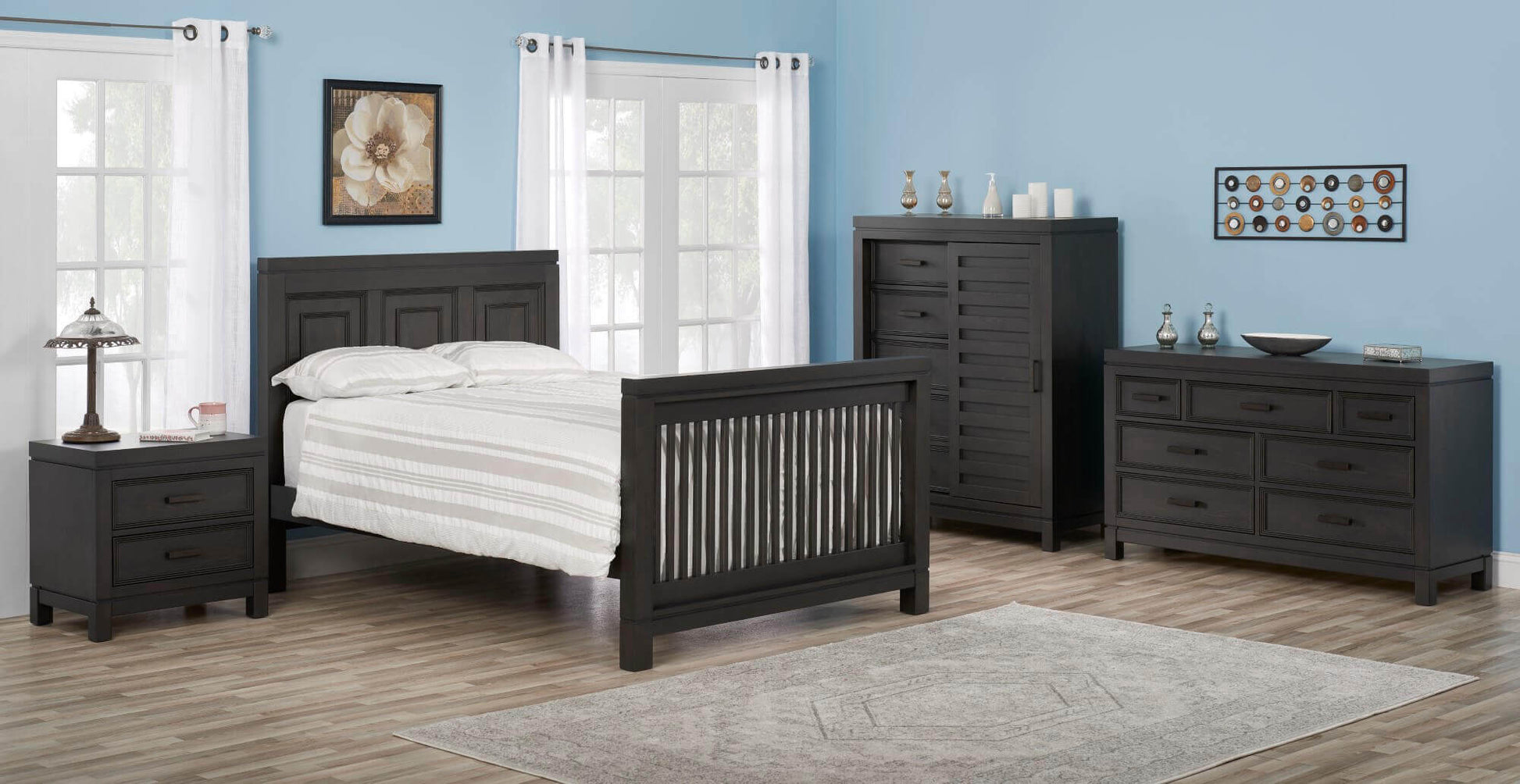 Manchester 4 In 1 Convertible Crib - Lifestyle Image Inclined Side View of Manchester Full Sized Bed Black Iron