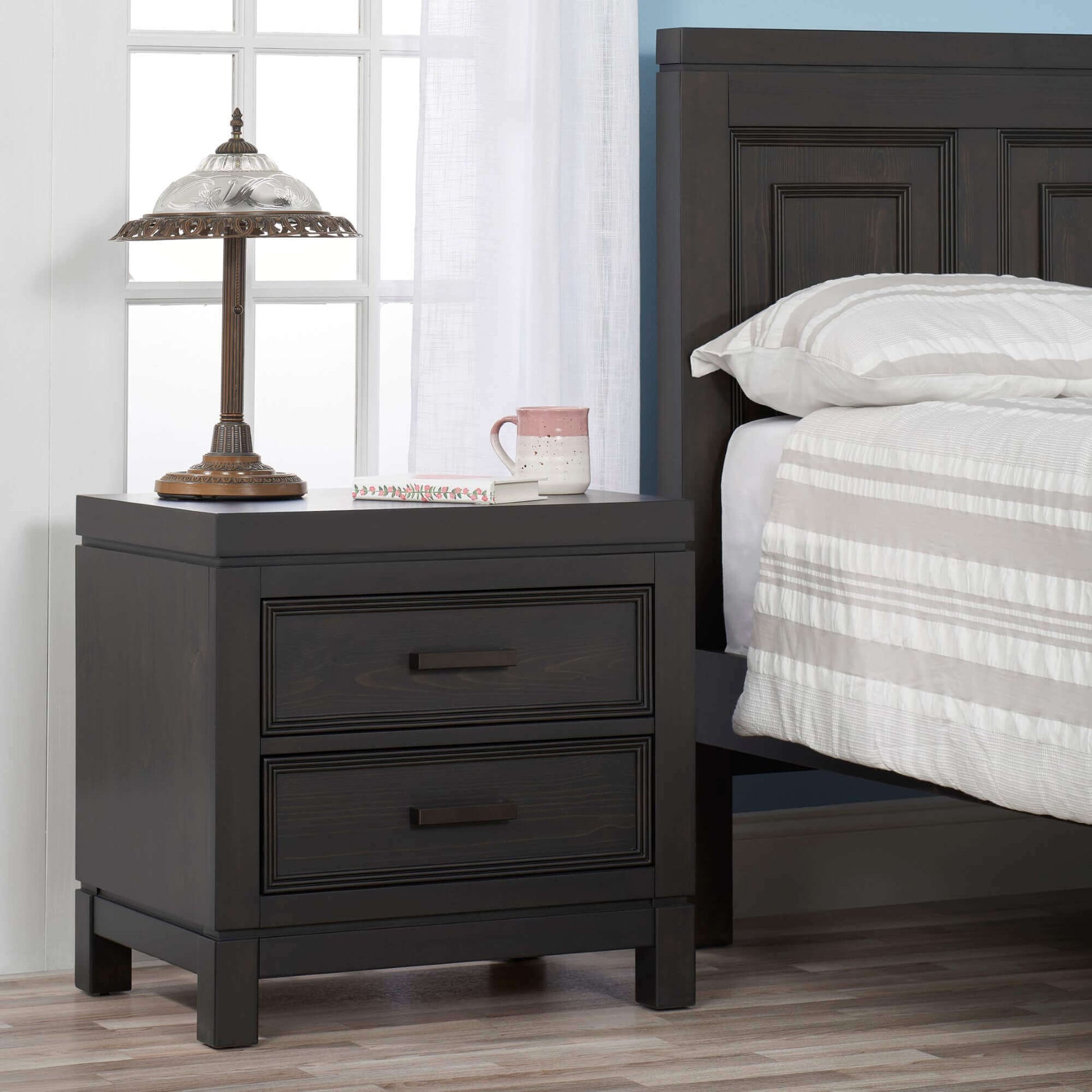Manchester 2 Drawer Night Stand - Lifestyle Image Inclined Side View of Manchester 2 Drawer Night Stand Black Iron