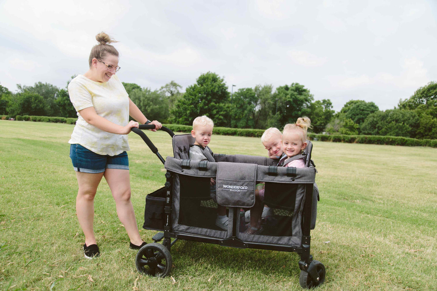 W4 Original Quad Stroller Wagon - Lifestyle Image Side View of Wagon Gray