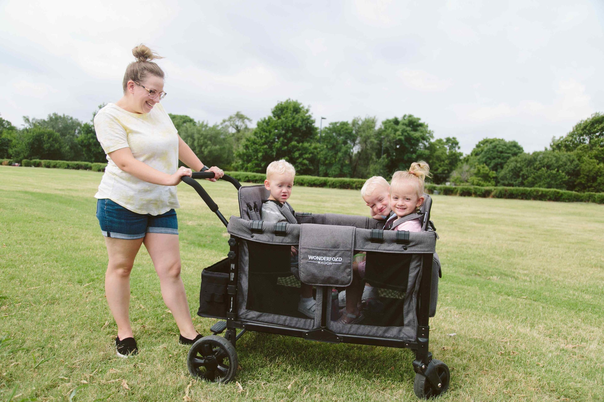 W4 Original Quad Stroller Wagon - Lifestyle Image Side View of Wagon Gray