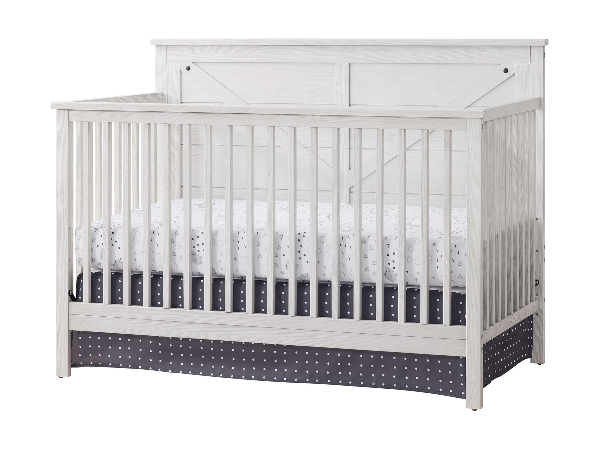 Montauk 4-in-1 Convertible Crib - Inclined Side View of Montauk 4-in-1 Convertible Crib Barn White