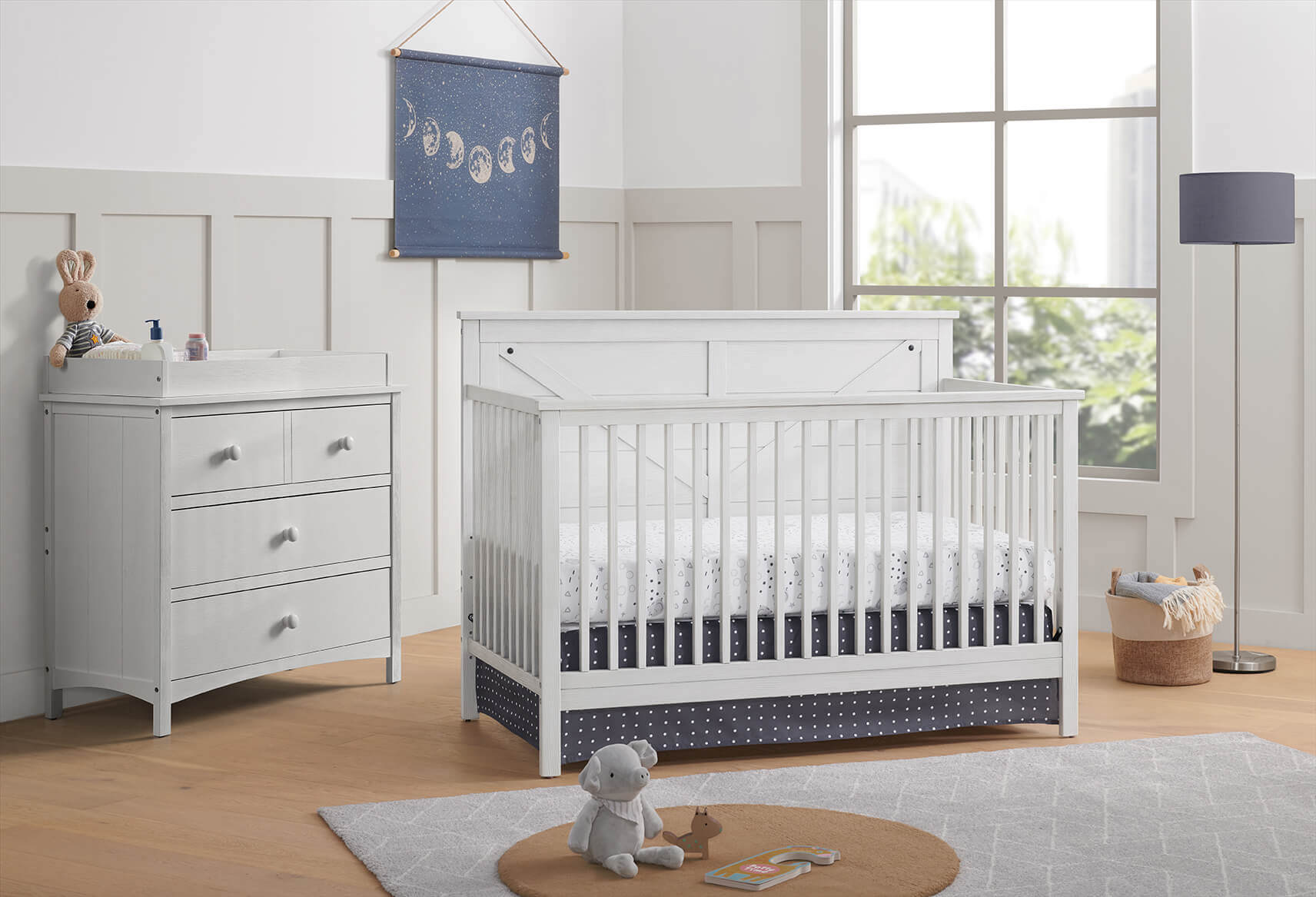 Montauk 3 Drawer Dresser- RTA - Lifestyle Image Inclined Side View of Montauk 3 Drawer Dresser with Montauk Crib Barn White