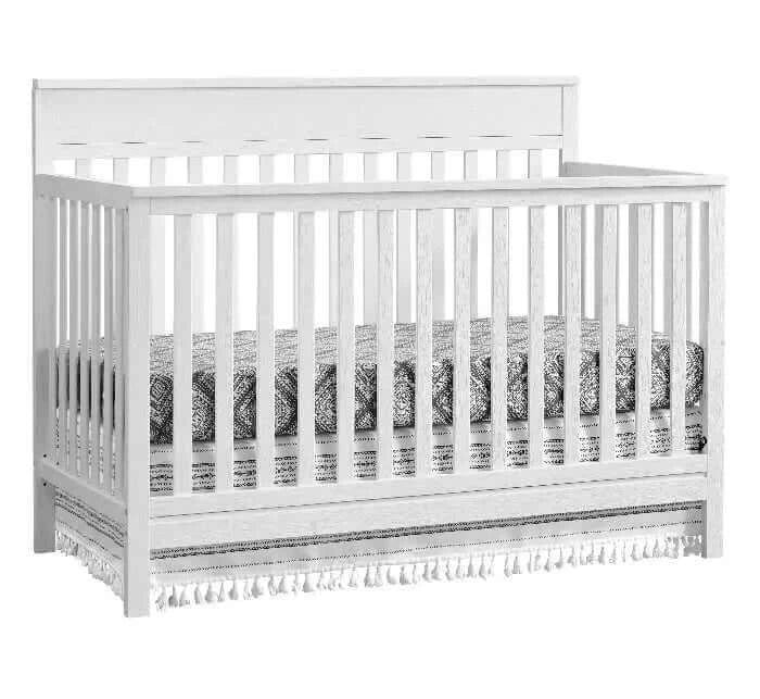 Castle Hill 4-in-1 Convertible Crib - Inclined Side View of Castle Hill 4-in-1 Convertible Crib Barn White