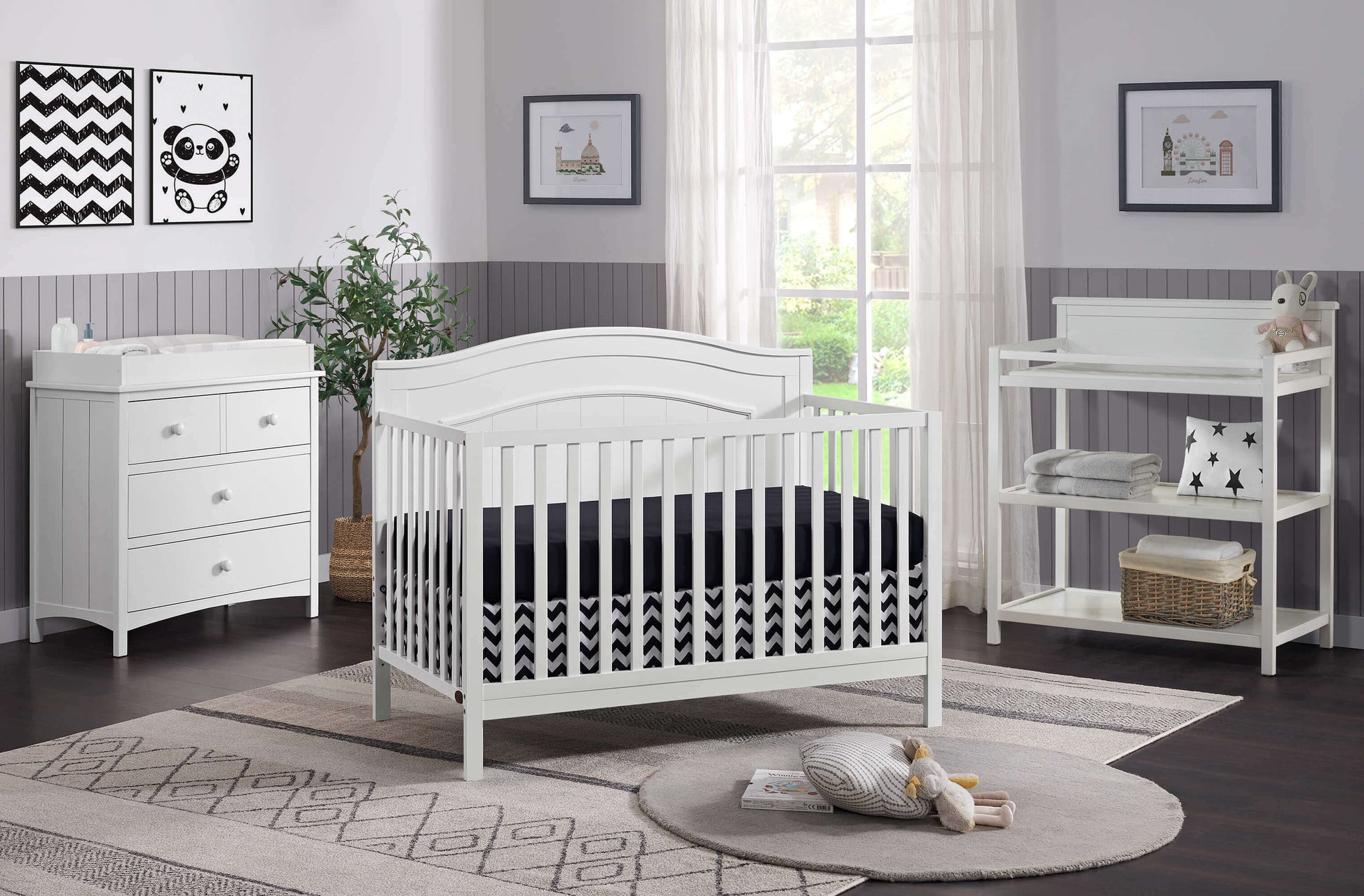 Nolan 4 in 1 Convertible Crib - Lifestyle Image Inclined Side View of Nolan 4 in 1 Convertible Crib Snow White