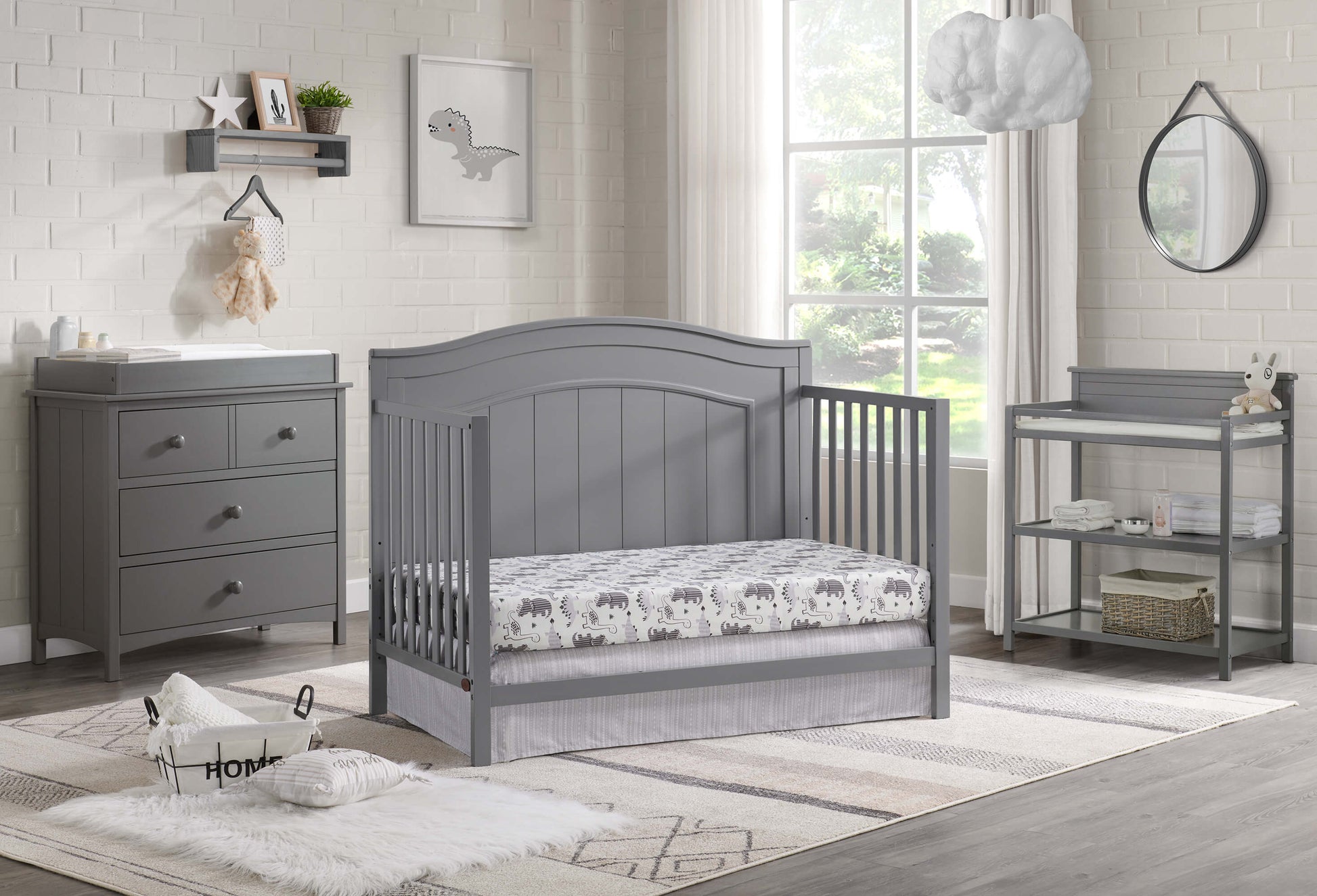 Nolan 4 in 1 Convertible Crib - Lifestyle Image Inclined Side View of Nolan Daybed Dove Gray