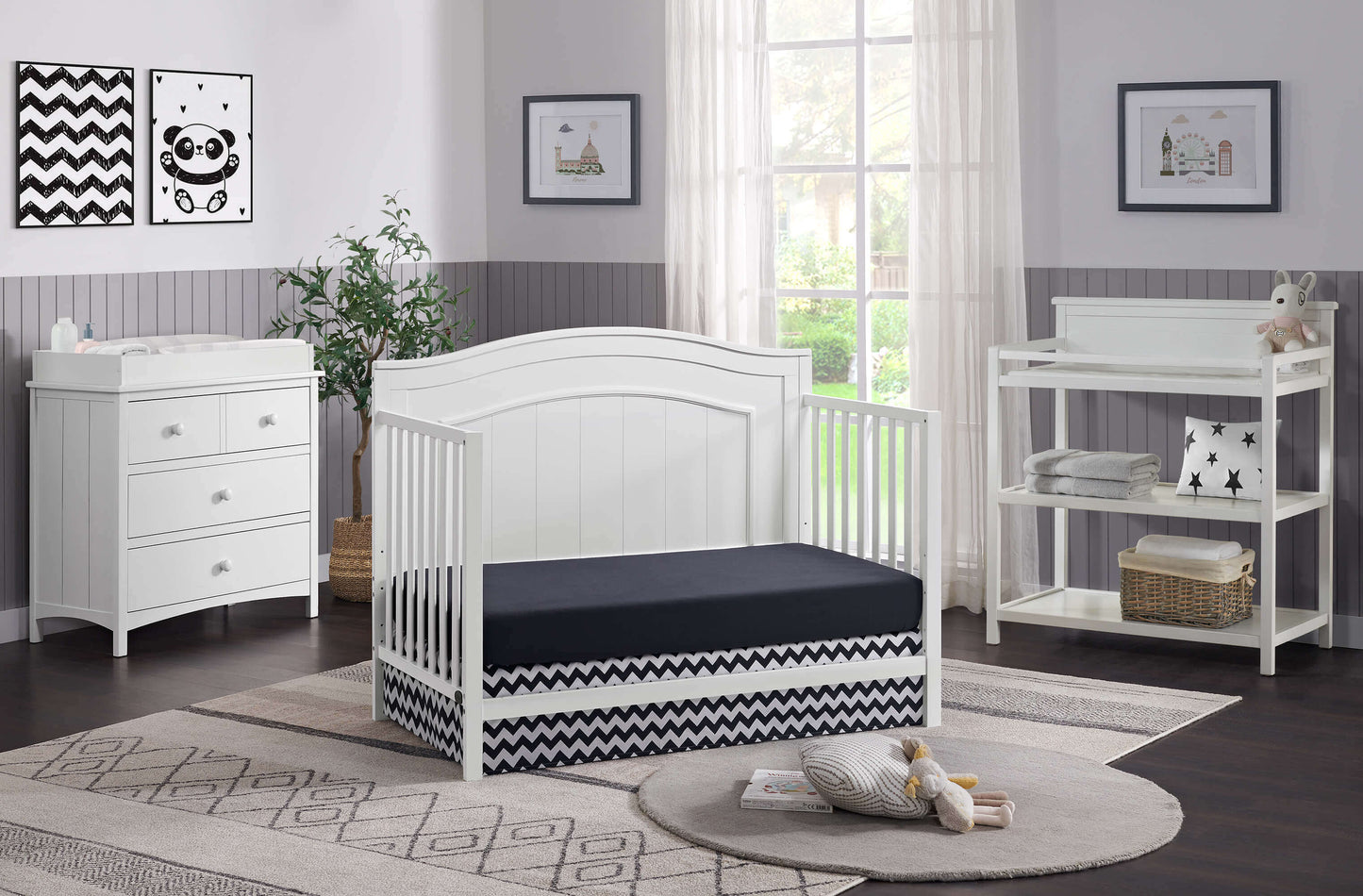 Nolan 4 in 1 Convertible Crib - Lifestyle Image Inclined Side View of Nolan Daybed Snow White