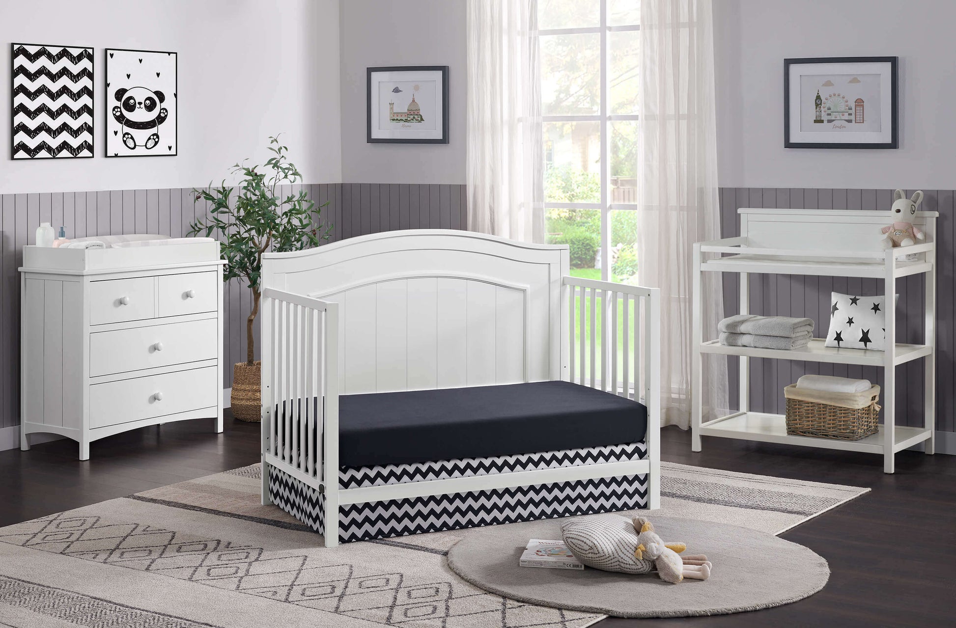 Nolan 4 in 1 Convertible Crib - Lifestyle Image Inclined Side View of Nolan Daybed Snow White
