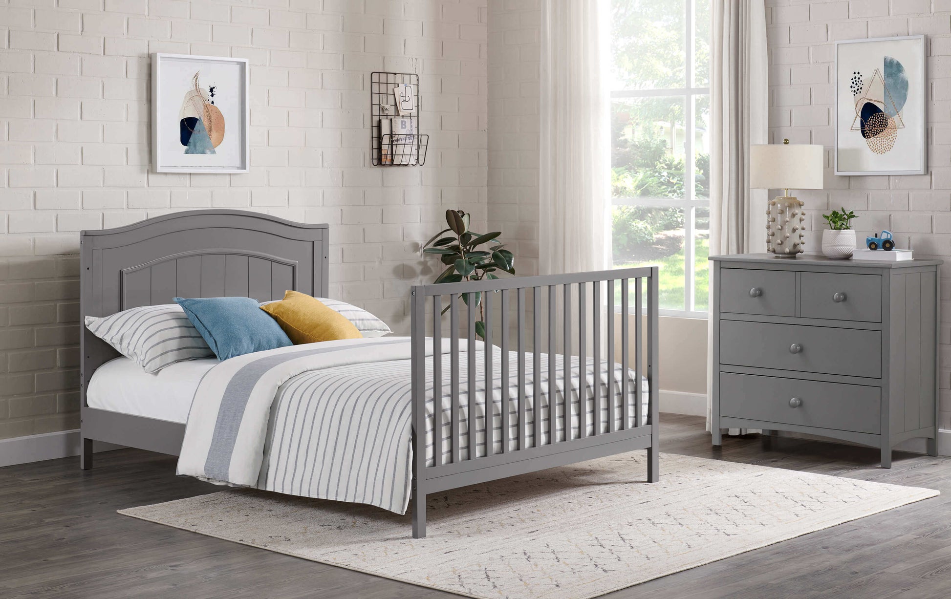 Nolan 4 in 1 Convertible Crib - Lifestyle Image Inclined Side View of Nolan Full Sized Bed Dove Gray
