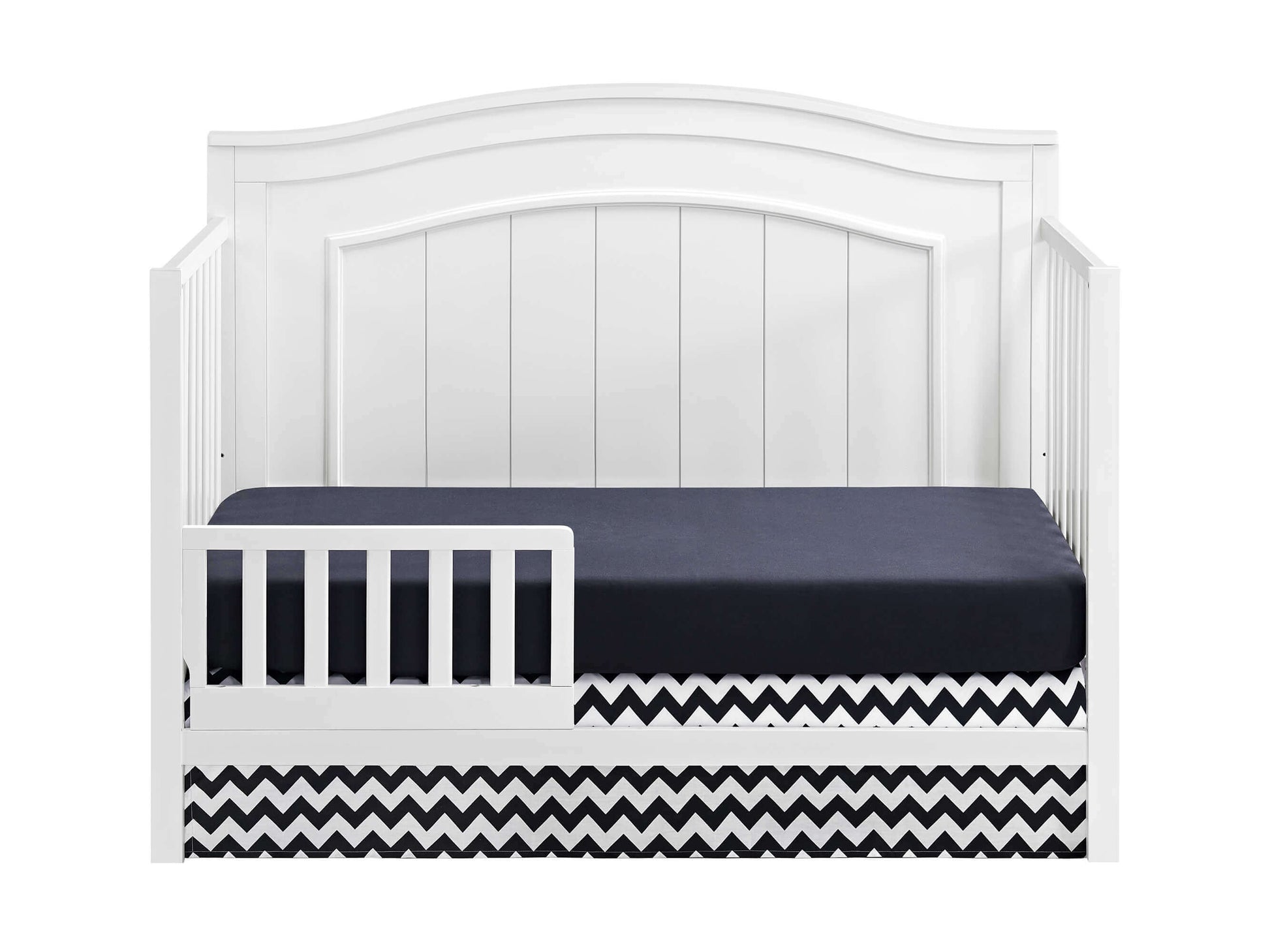 Nolan 4 in 1 Convertible Crib - Inclined Side View of Nolan 4 in 1 Convertible Crib Snow White with Guard Rail