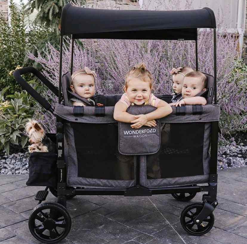 W4 Original Quad Stroller Wagon - Lifestyle Image Sitting Baby Wagon Gray