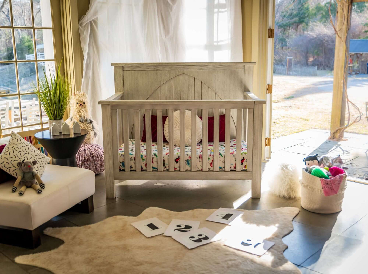Relic Winchester 4-in-1 Convertible Crib - Lifestyle Image Front View of Winchester 4-in-1 Convertible Crib Fossil