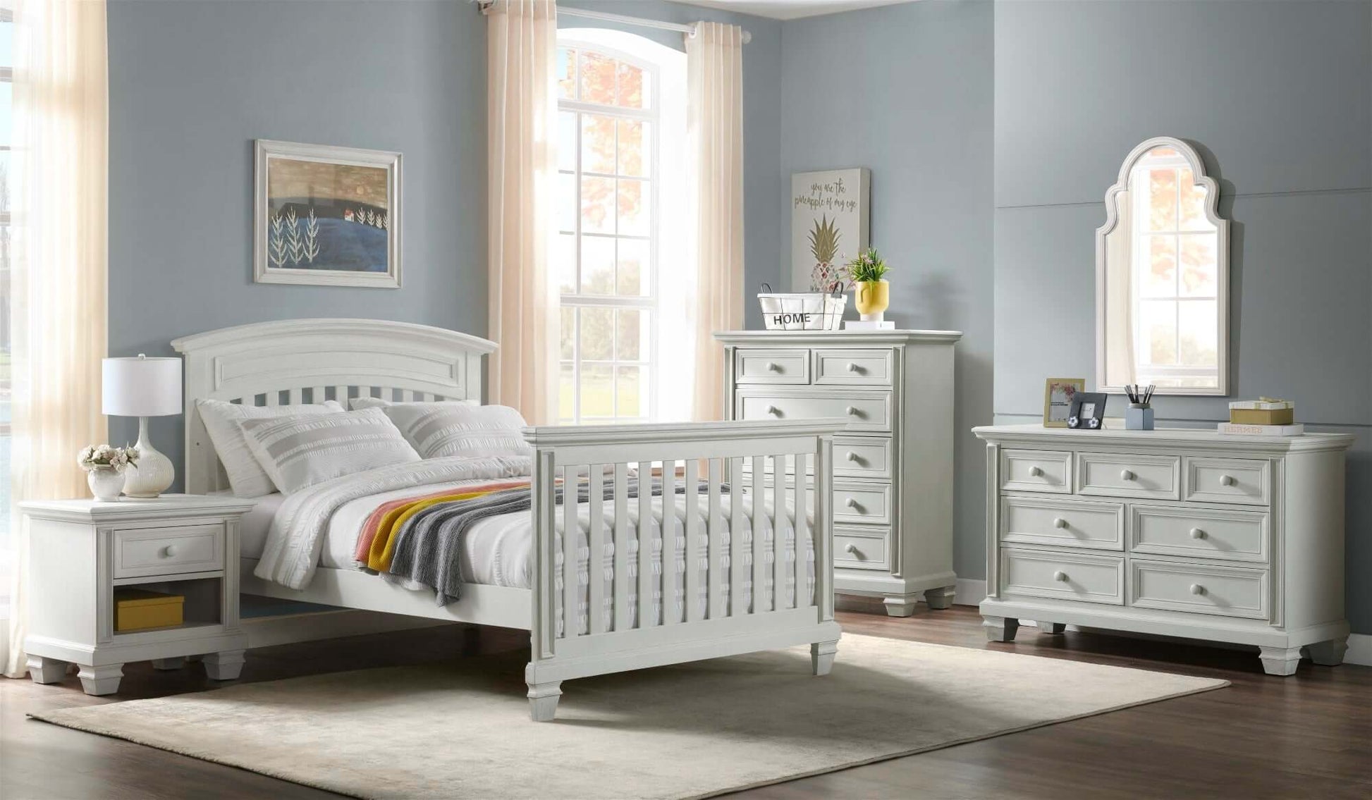 Richmond Nightstand - Lifestyle Image Inclined Side View of Richmond Nightstand Oyster White Beside Full Sized Bed