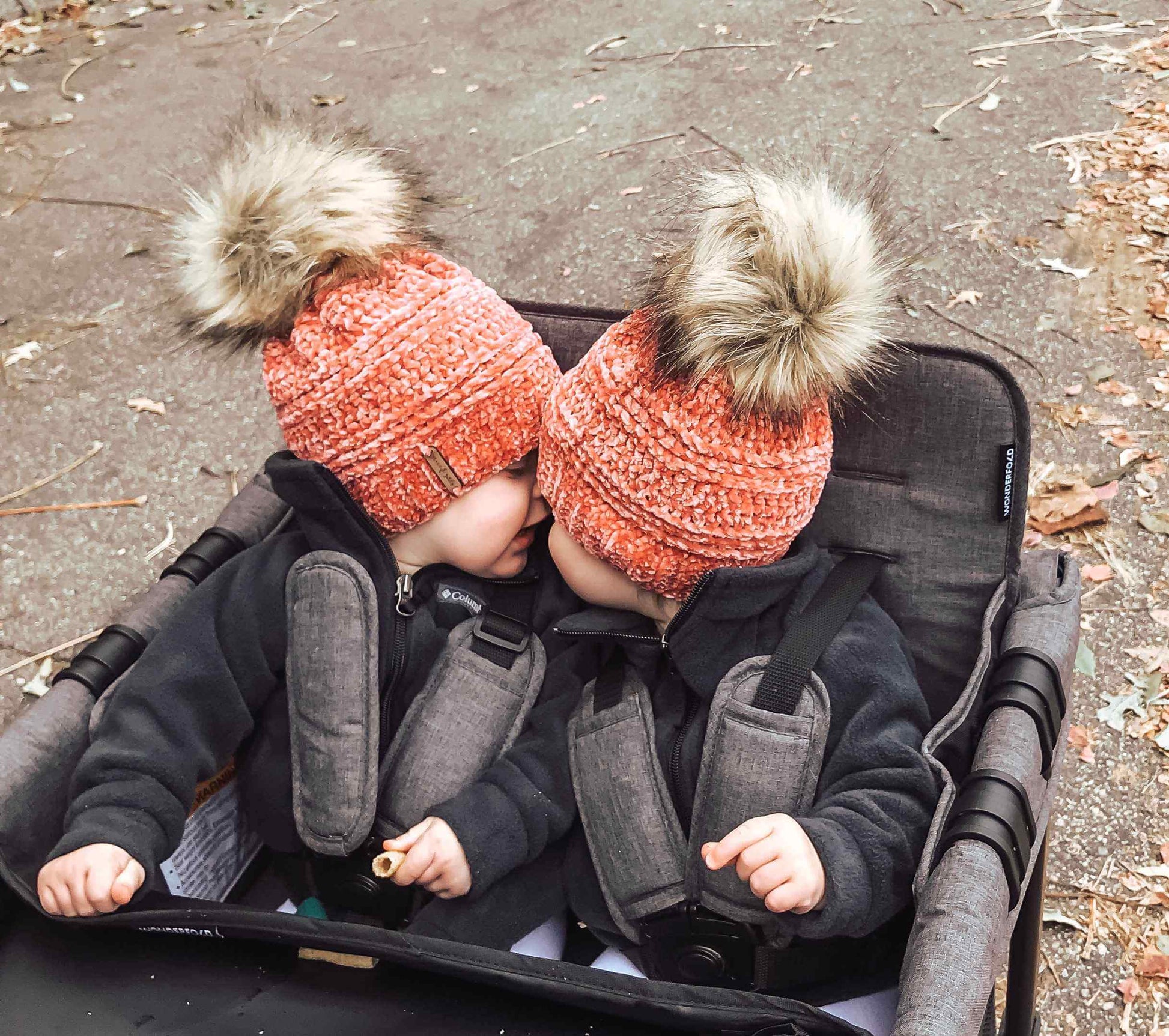 W4 Original Quad Stroller Wagon - Lifestyle Image Sitting Baby Wagon Gray