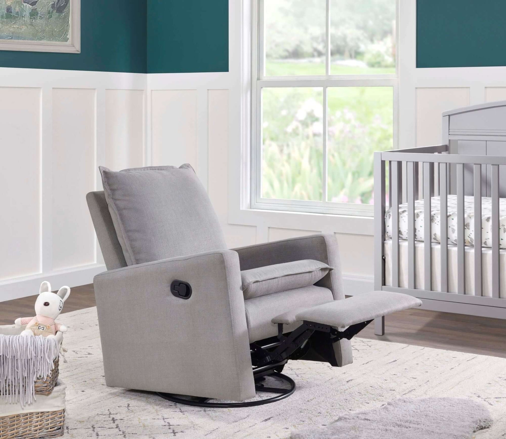 Uptown Nursery Swivel Rocker and Recliner - Lifestyle Image Inclined Side View of Uptown Nursery Swivel Rocker and Recliner Gray with Plush rocker