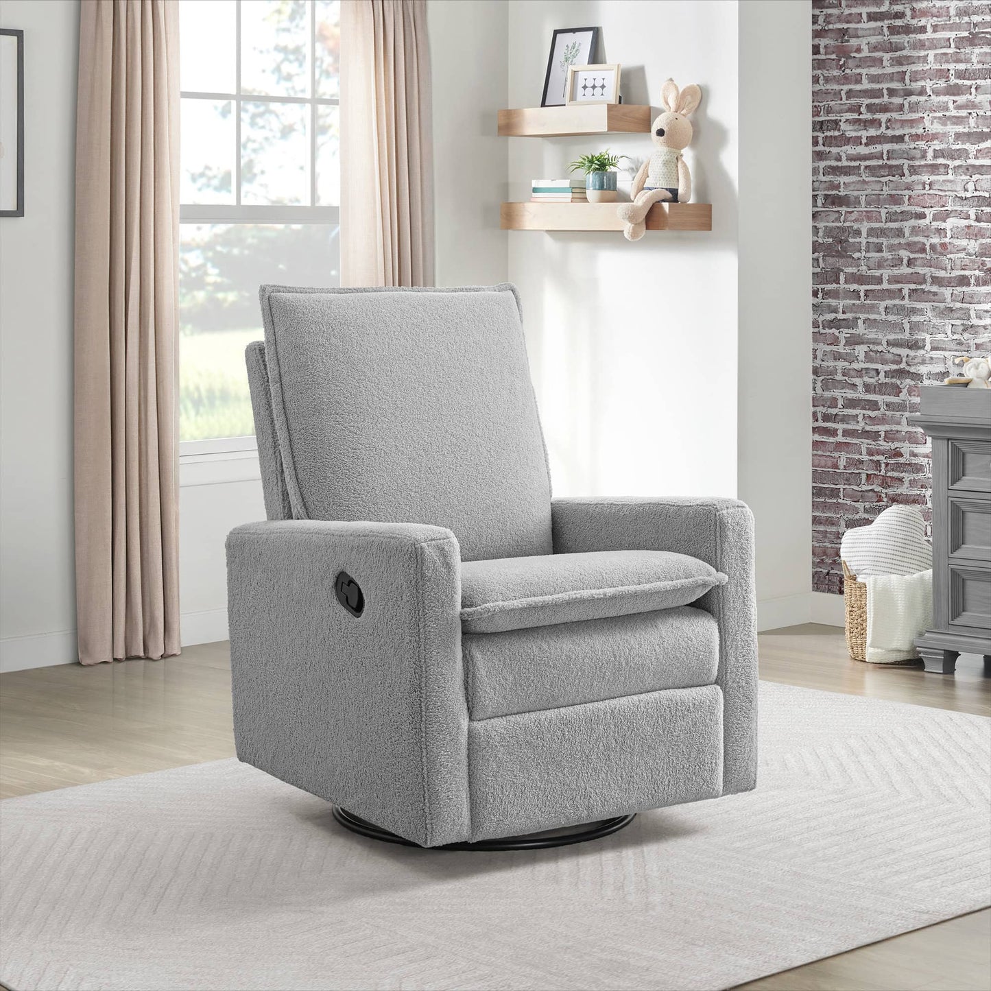 Uptown Nursery Swivel Rocker and Recliner - Lifestyle Image Inclined Side View of Uptown Nursery Swivel Rocker and Recliner Bounce White with Plush rocker