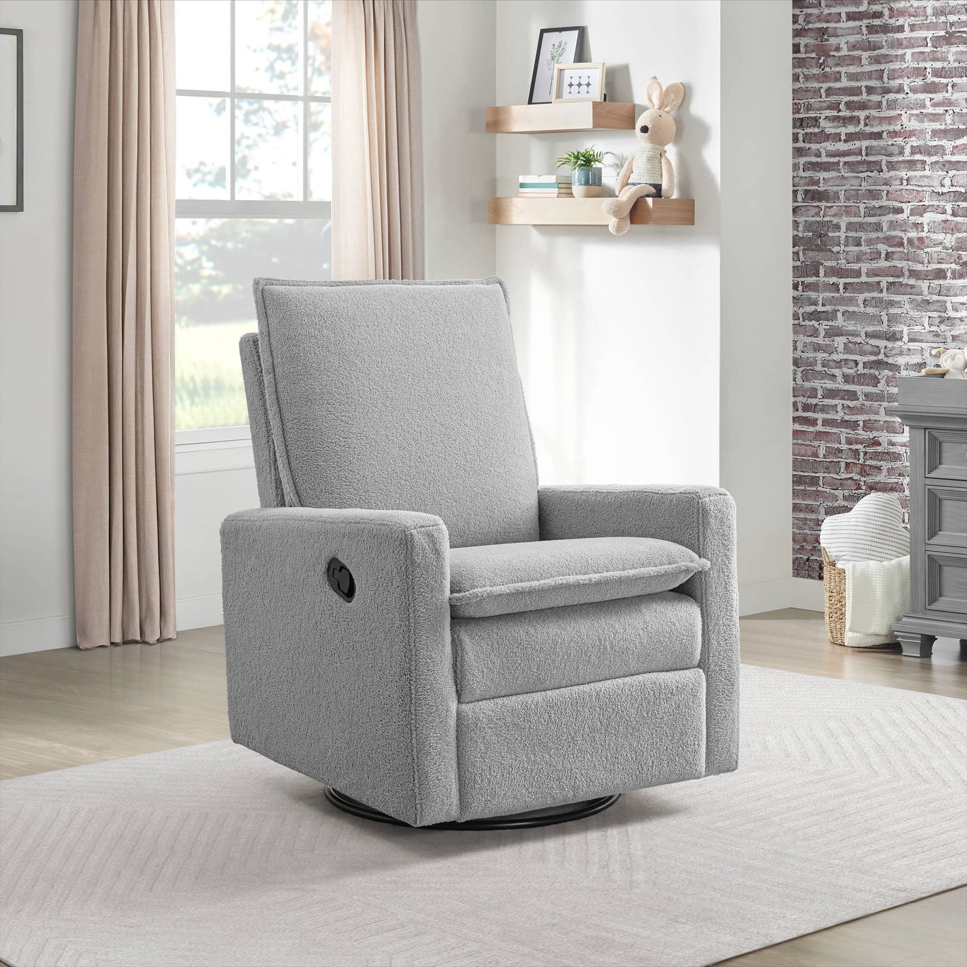 Uptown Nursery Swivel Rocker and Recliner - Lifestyle Image Inclined Side View of Uptown Nursery Swivel Rocker and Recliner Bounce White with Plush rocker