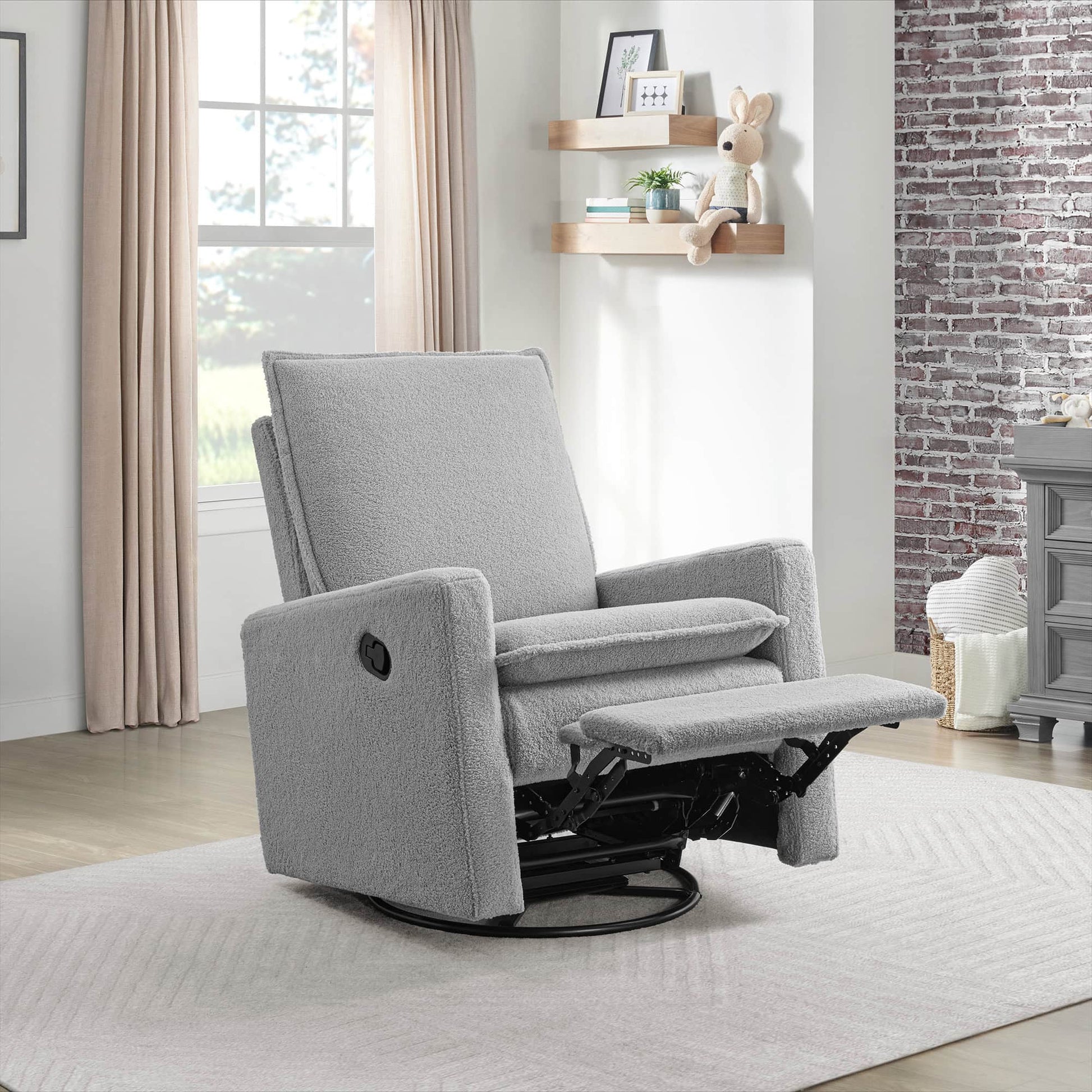 Uptown Nursery Swivel Rocker and Recliner - Lifestyle Image Inclined Side View of Uptown Nursery Swivel Rocker and Recliner Bounce White with Plush rocker