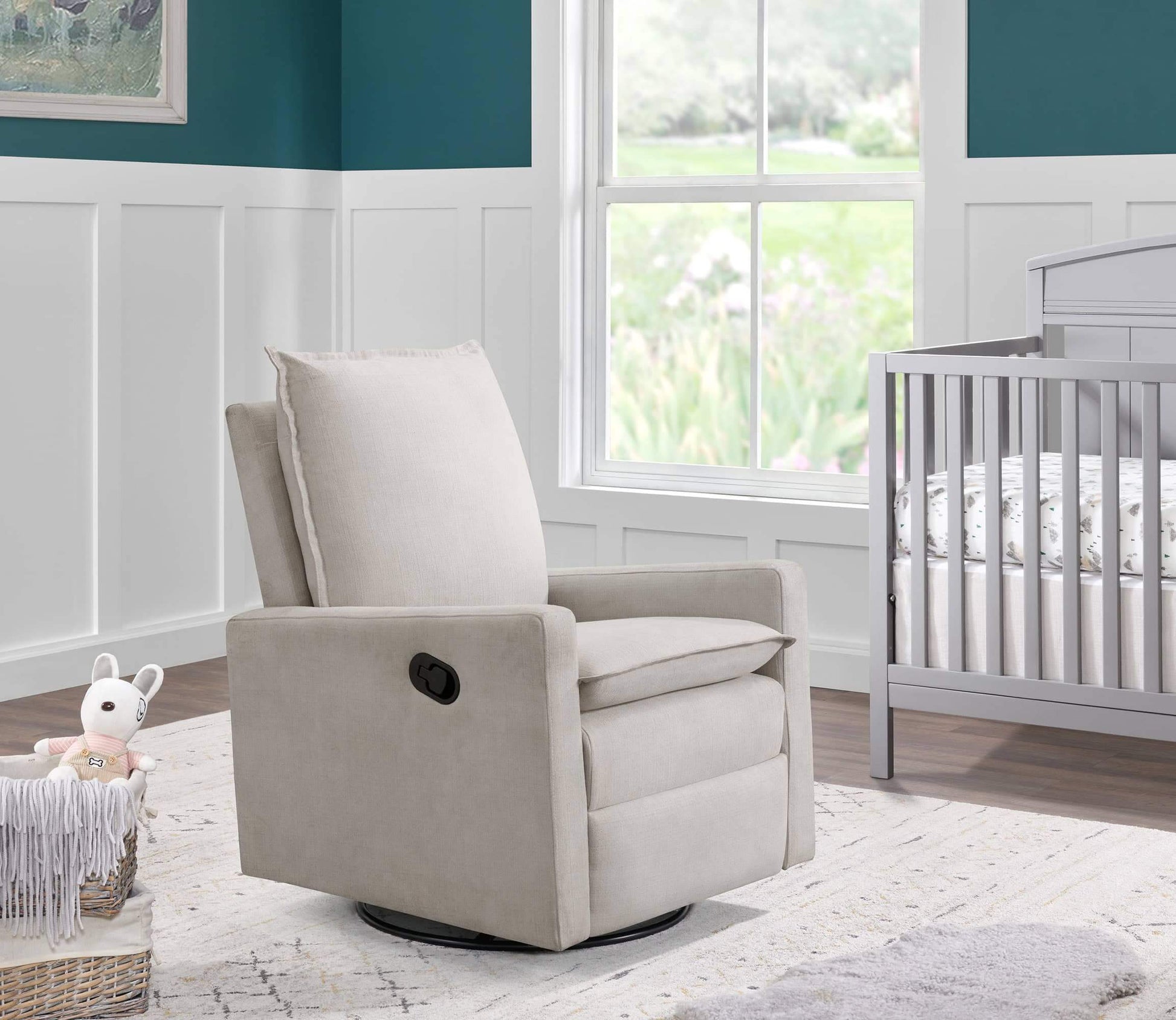 Uptown Nursery Swivel Rocker and Recliner - Lifestyle Image Inclined Side View of Uptown Nursery Swivel Rocker and Recliner Sand