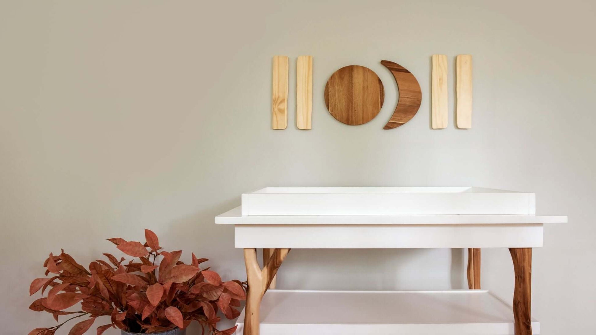 Branch Open Shelf Changing Table - Lifestyle Image of Zoomed Open Shelf Changing Table Acacia