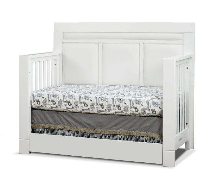 Crystal Convertible Crib - Lifestyle Image Inclined Side View of Crystal Daybed White