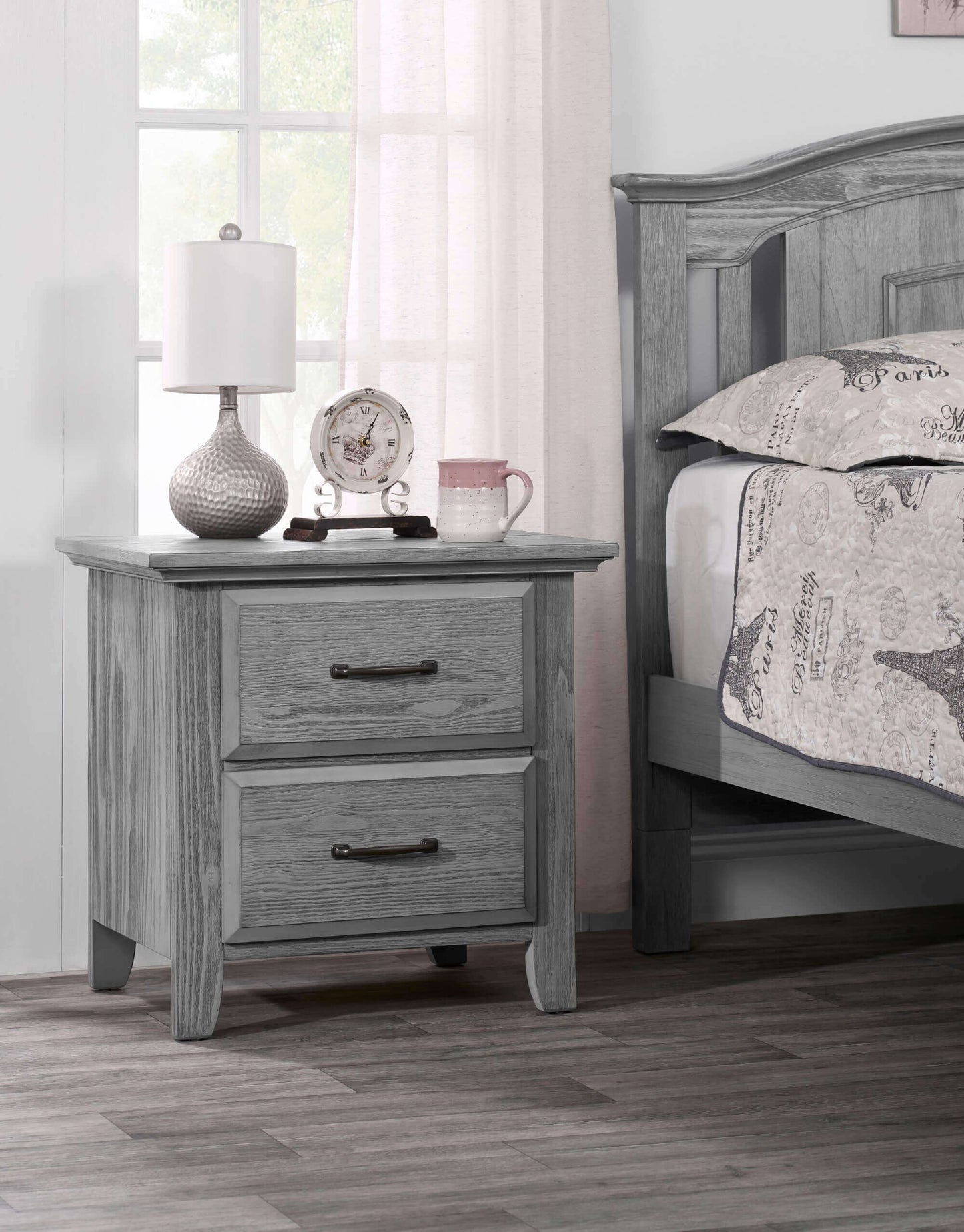 Willowbrook 2 Drawer Nightstand - Lifestyle Image Inclined Side View of Willowbrook 2 Drawer Nightstand Graphite Gray