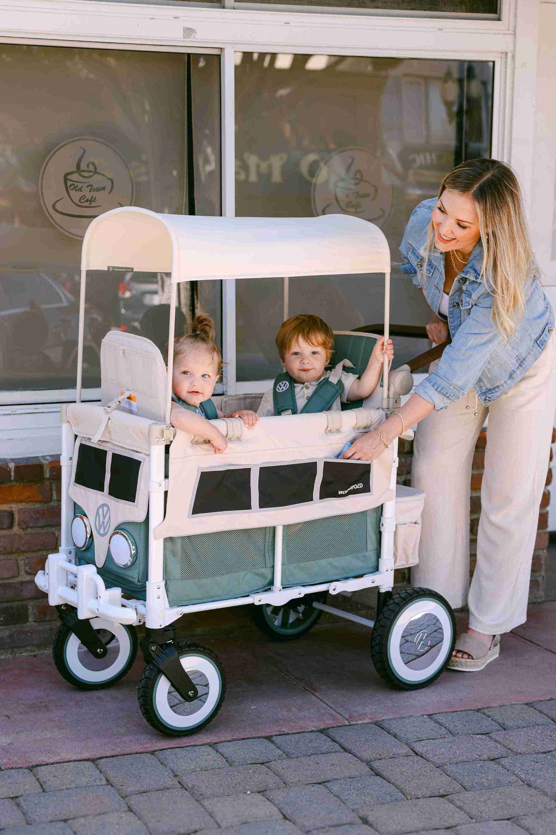 VW2 Volkswagen Stroller Wagon - Lifestyle Image Inclined Side View of Wagon Green