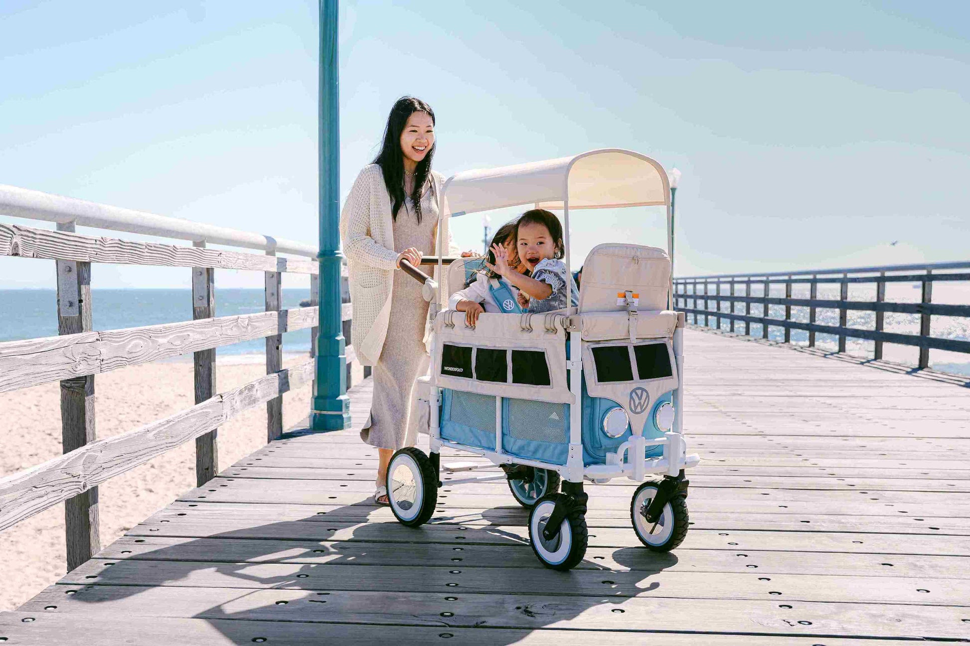 VW2 Volkswagen Stroller Wagon - Lifestyle Image Inclined Side View of Wagon Blue