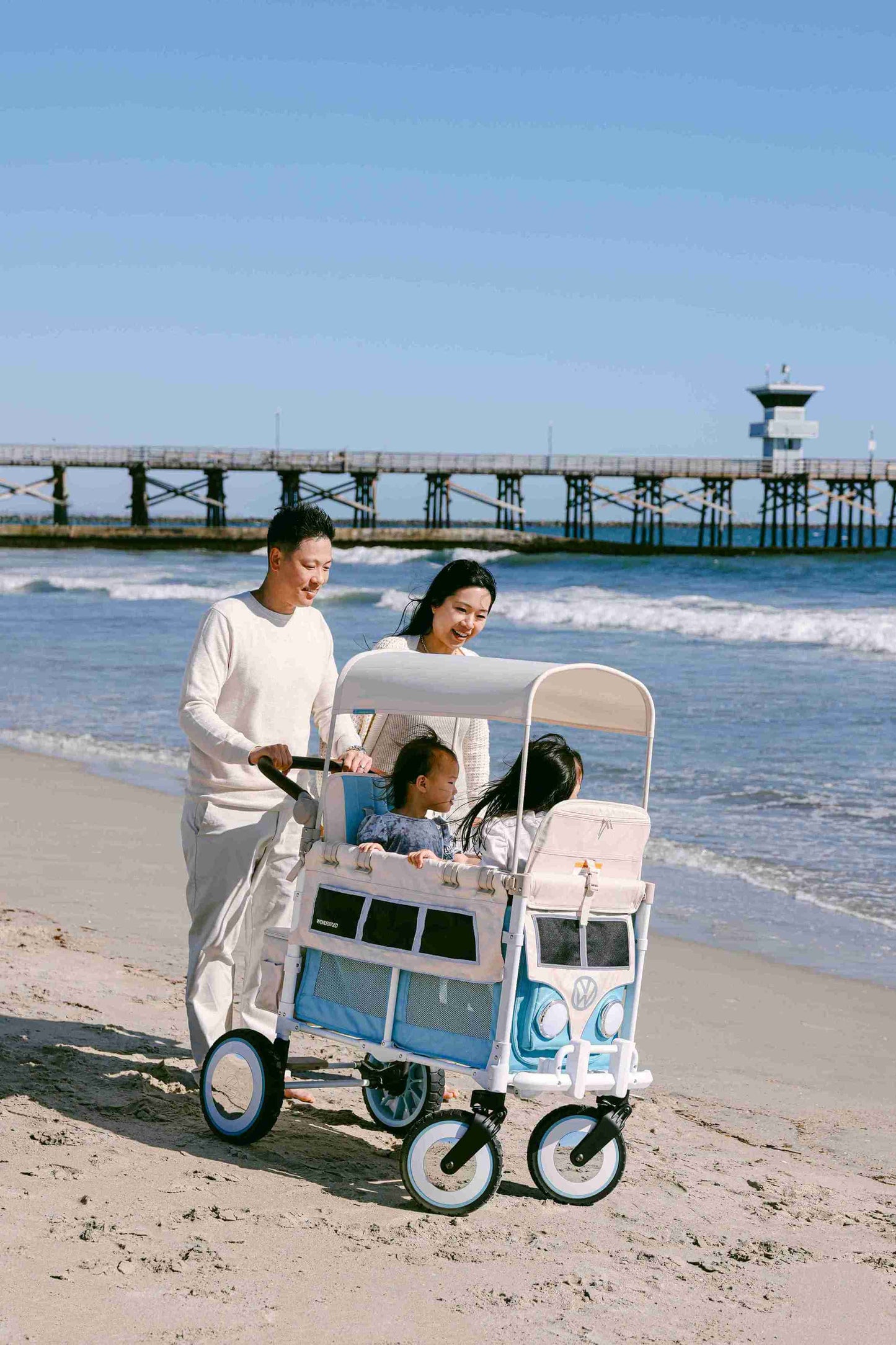 VW2 Volkswagen Stroller Wagon - Lifestyle Image Inclined Front View of Wagon Green