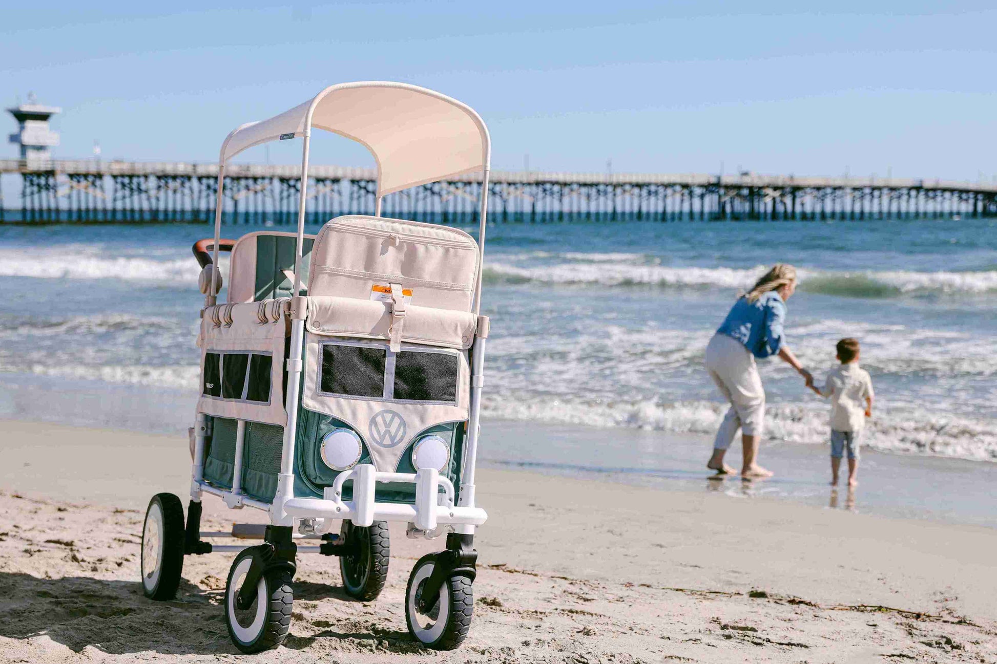 VW2 Volkswagen Stroller Wagon - Lifestyle Image Inclined Side View of Wagon Green