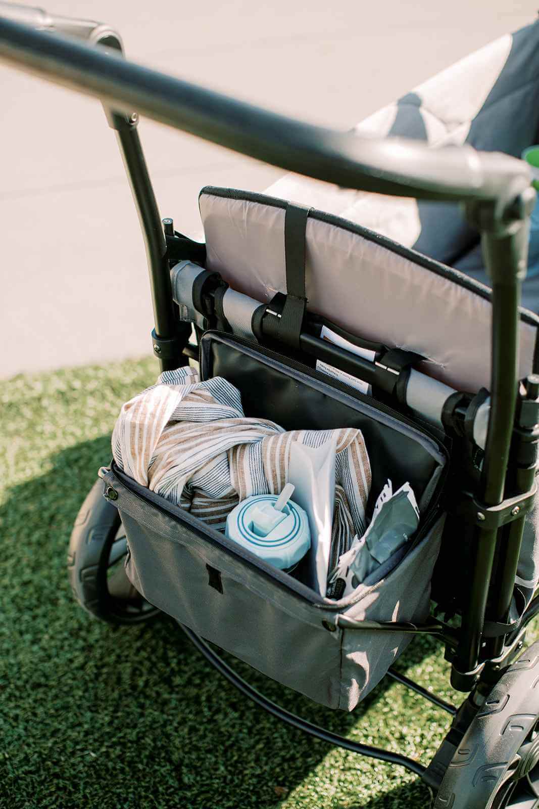X2 Double Stroller Wagon - Lifestyle Image of Storage Basket of X2 Double Stroller Wagon Gray