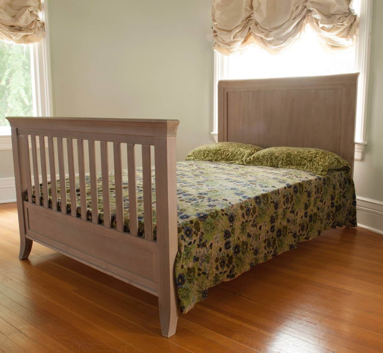 Cameo Sleigh Toddler Bed Conversion Kit - Lifestyle Image Side View of Sleigh Toddler Bed Conversion Kit Toast