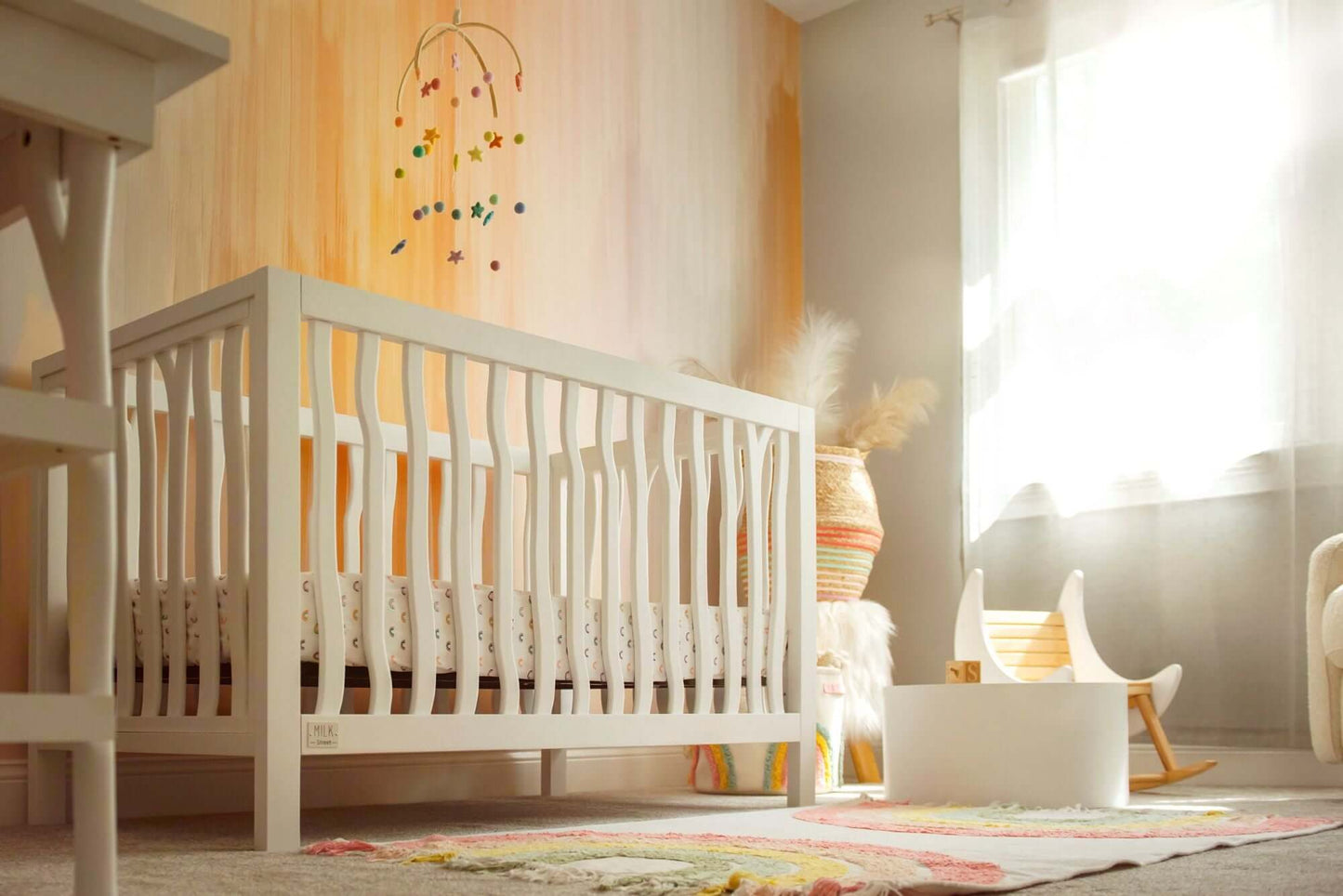 Branch 4 in 1 Convertible Crib - Low Angle Lifestyle Image of 4 in 1 Convertible Crib Snow White In The Baby Room