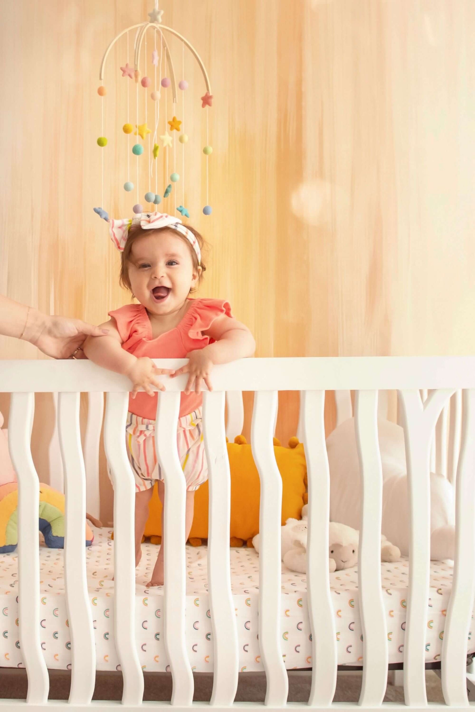 Branch 4 in 1 Convertible Crib - Lifestyle Image of 4 in 1 Convertible Crib Snow White With Baby Inside