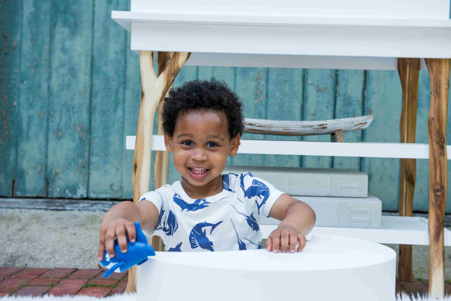 Branch Open Shelf Changing Table - Lifestyle In use Image of Open Shelf Changing Table Natural Snow