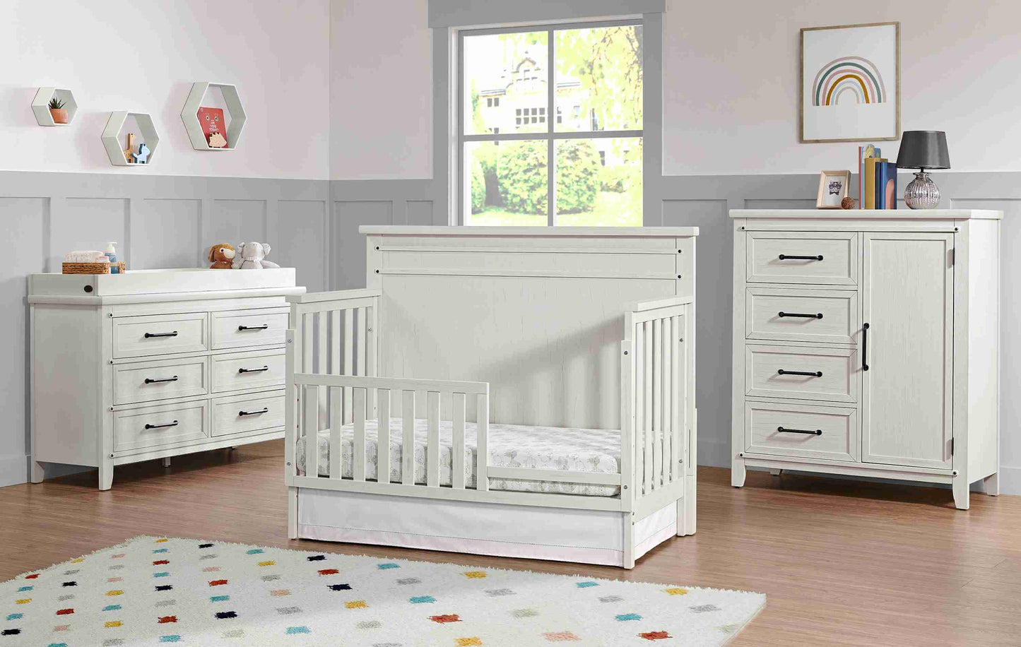 Ellison 6 Drawer Dresser - Lifestyle Image Inclined Side View of Ellison Changing Topper White on Top of 6 Drawer Dresser