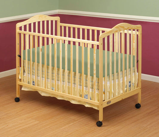Jenny Full Size Crib - Lifestyle Image Inclined Side View of Jenny Full Size Crib Natural
