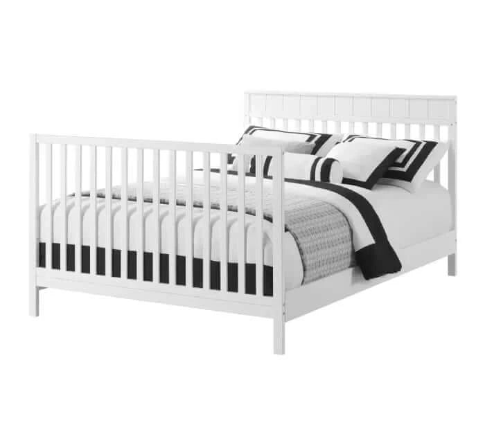 Logan 4-in-1 Convertible Crib - White full bed side